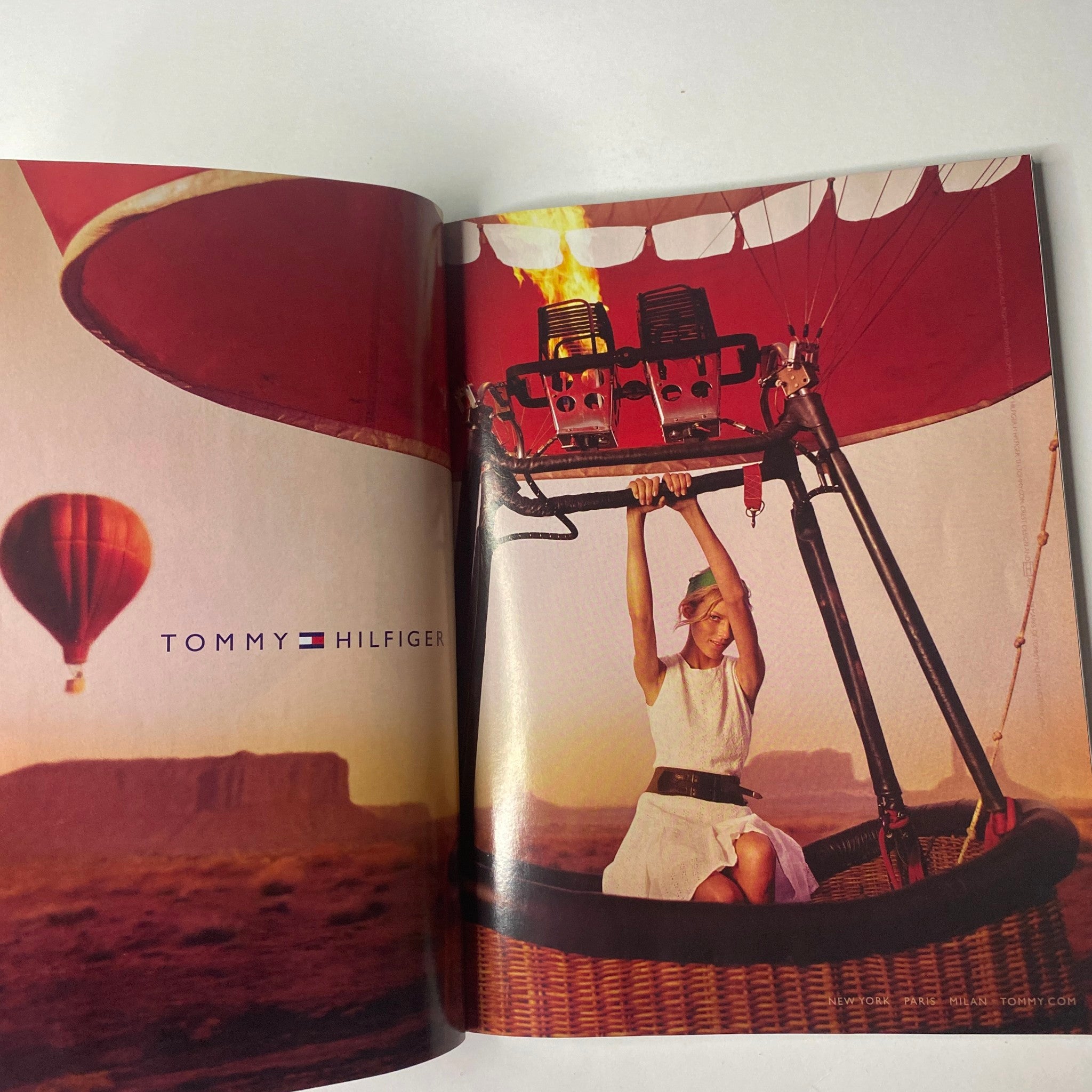 Vogue Magazine February 2007 Renée Zellweger Cover featuring a Tommy Hilfiger advertisement with a woman in a hot air balloon, showcasing a stylish fashion moment.