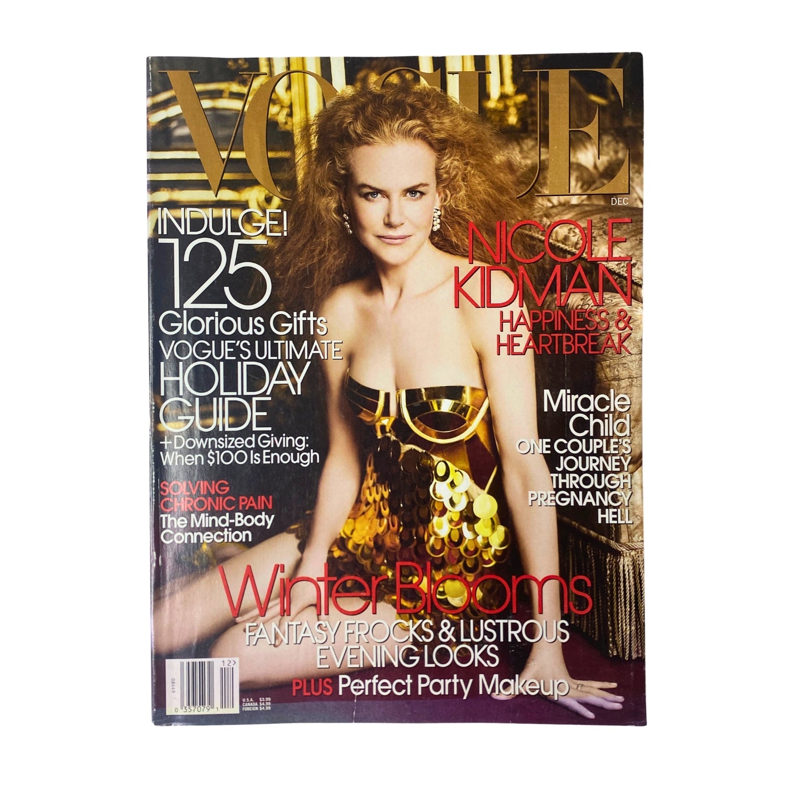 Vogue Magazine December 2006 featuring Nicole Kidman on the cover, showcasing a glamorous editorial theme with 'Winter Blooms' highlighted.