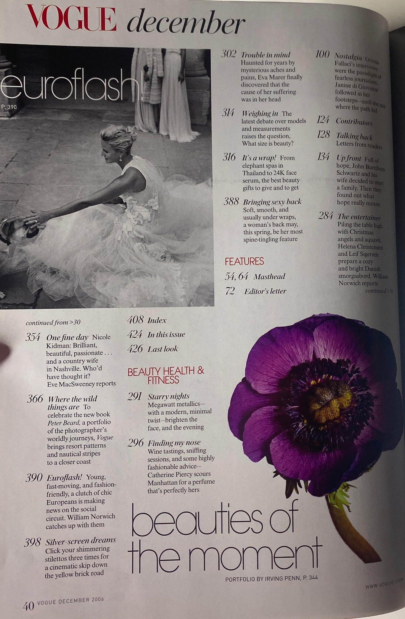 Vogue Magazine December 2006 showcases an editorial page titled 'Euroflash' alongside a beautiful floral photograph, highlighting beauty and fashion trends.