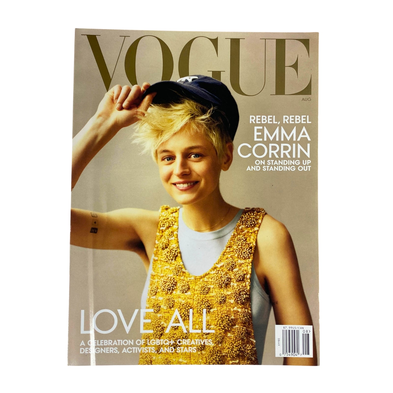Vogue Magazine August 2022 featuring Emma Corrin on the cover, styled in a Louis Vuitton tank dress and a baseball cap, promoting inclusivity and LGBTQ+ voices.