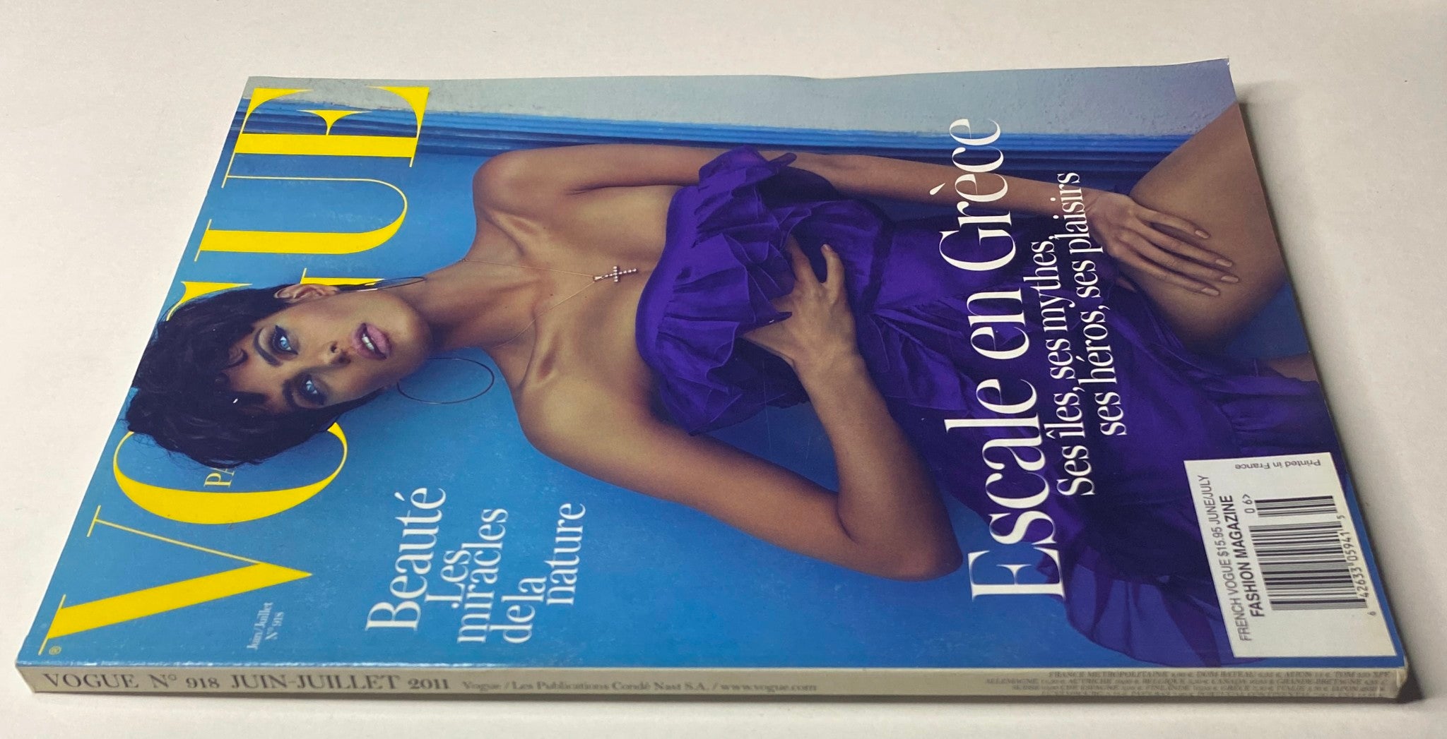 Cover of Vogue Paris Magazine June - July 2011 No. 918 featuring Isabeli Fontana in purple attire, highlighting summer fashion trends.