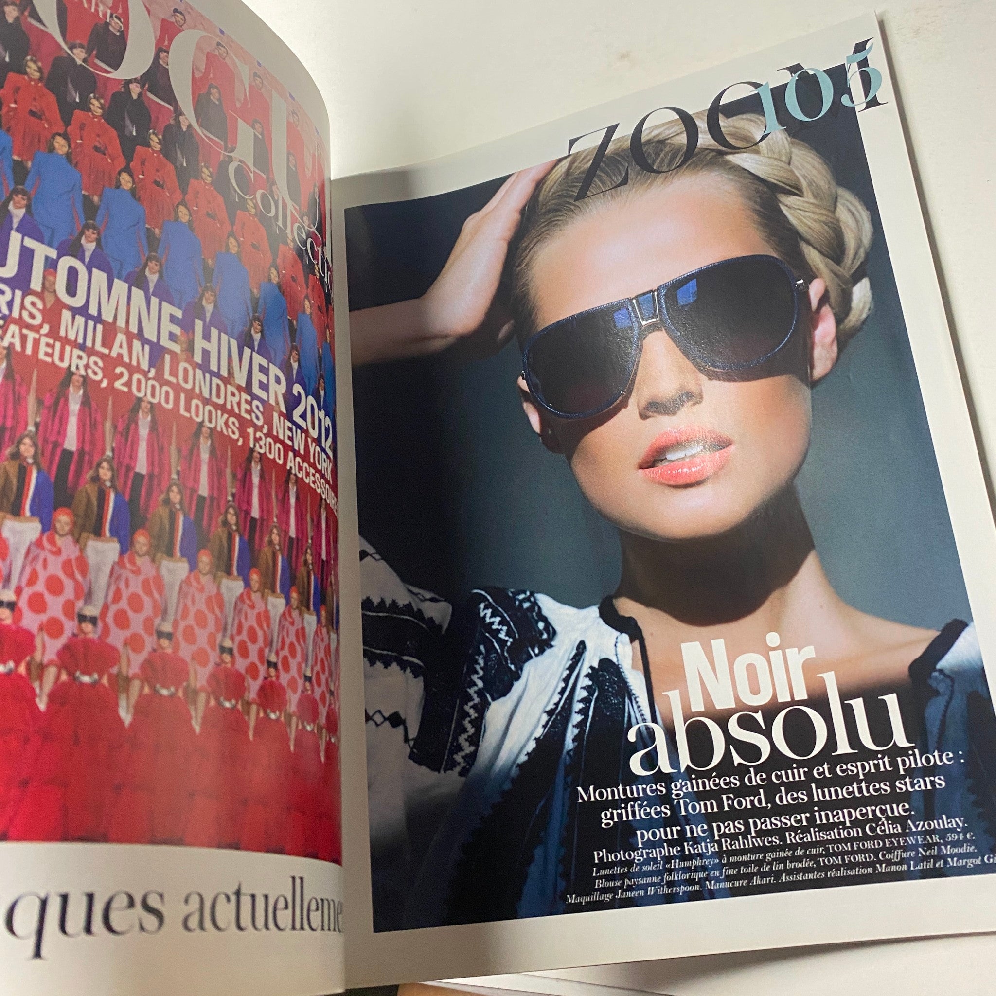 Inside editorial page of Vogue Paris Magazine June - July 2012 No. 928 highlighting high-fashion eyewear and styling, featuring an elegant model in a chic pose.