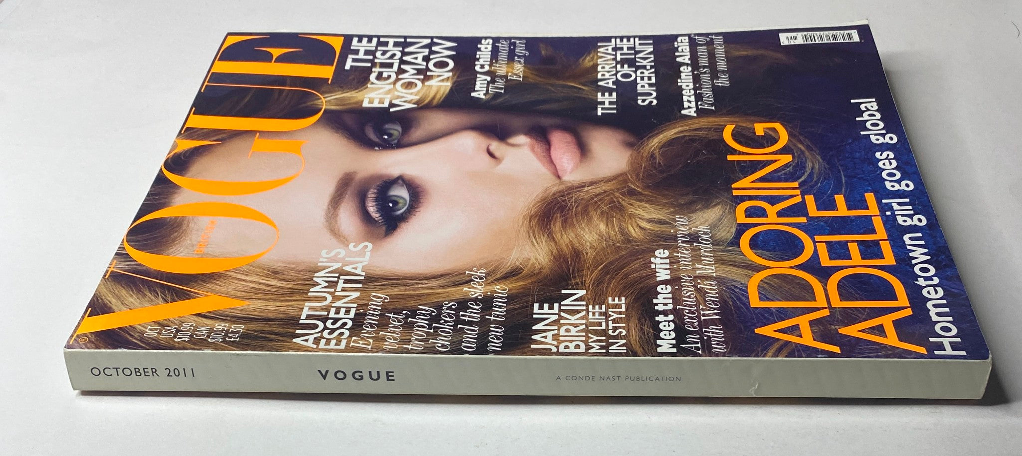 Side view of Vogue British Magazine October 2011 with Adele on the cover, showcasing its excellent condition.