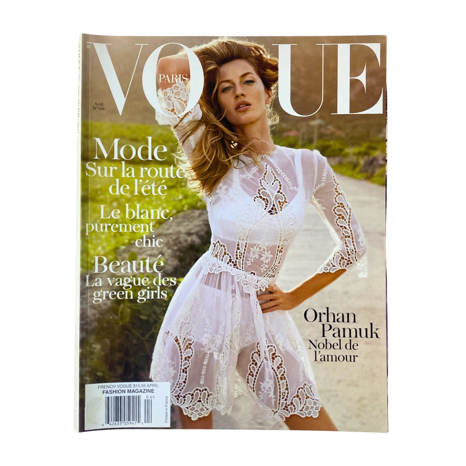 Cover of Vogue Paris Magazine April 2011 No. 916 featuring model Gisele Bündchen in a chic white lace dress, highlighting fashion trends for spring, in very good condition.