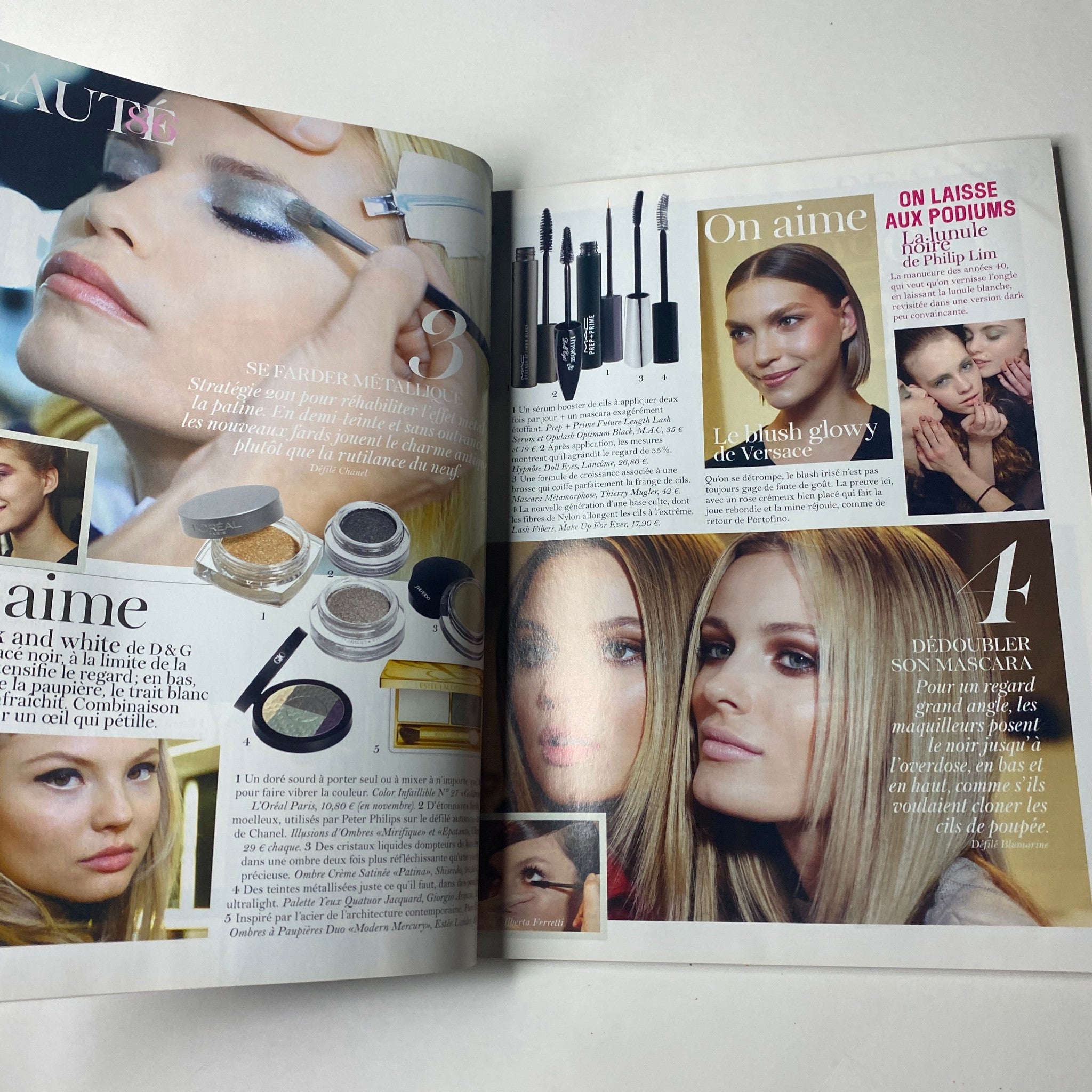 Beauty feature in Vogue Paris Magazine August 2011 No. 919 showcasing makeup products and tips for achieving a glamorous look with celebrity models, perfect for beauty lovers.