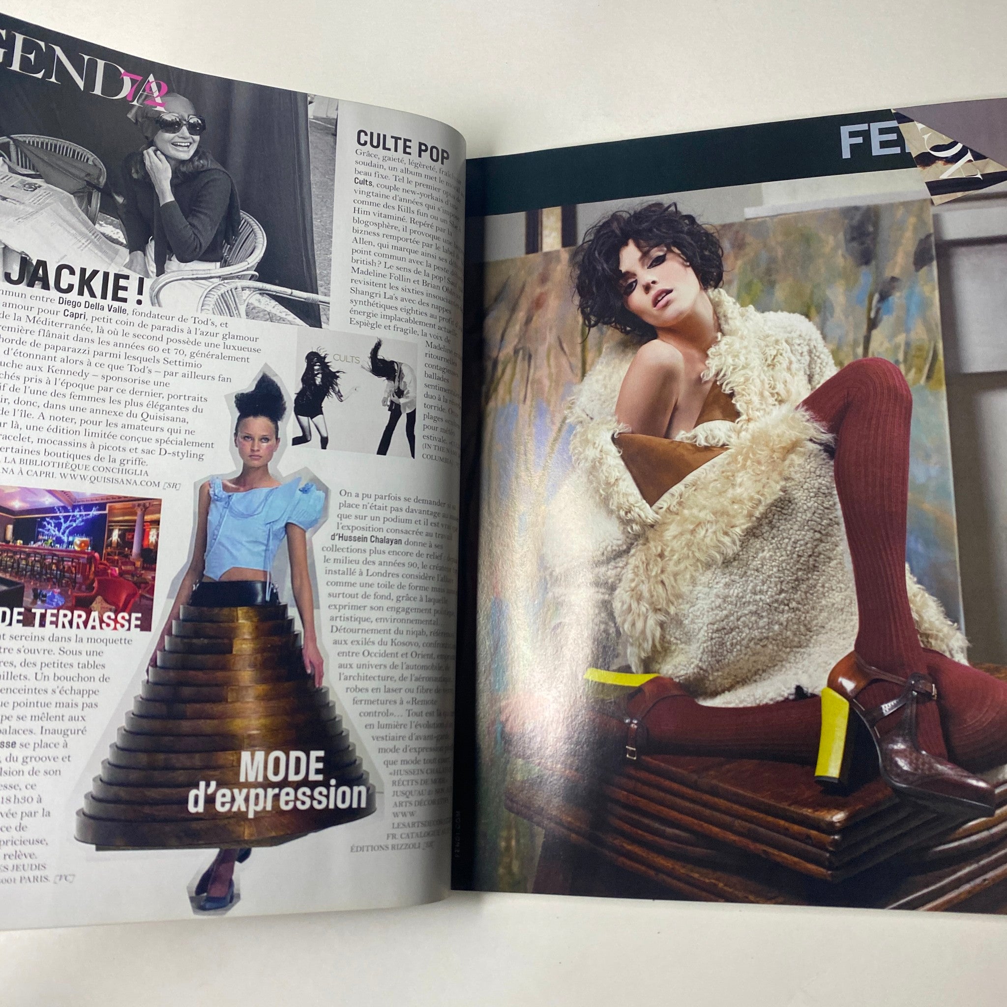 Fashion editorial from Vogue Paris Magazine August 2011 No. 919, showcasing avant-garde styles and design with creative photography, embodying high fashion trends.