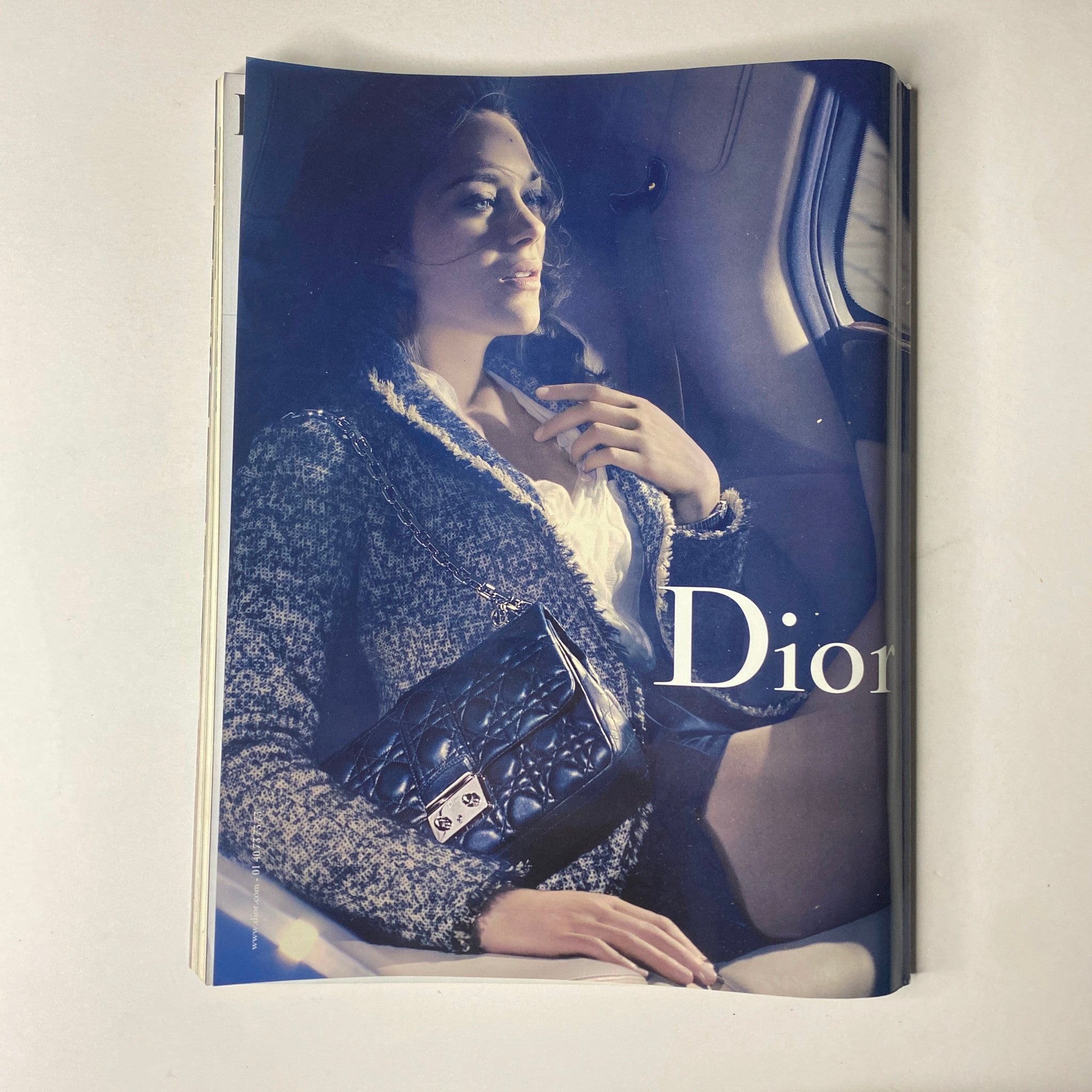 Dior advertisement featured in Vogue Paris Magazine August 2011 No. 919, displaying luxury fashion with an elegant model, ideal for fashion aficionados.