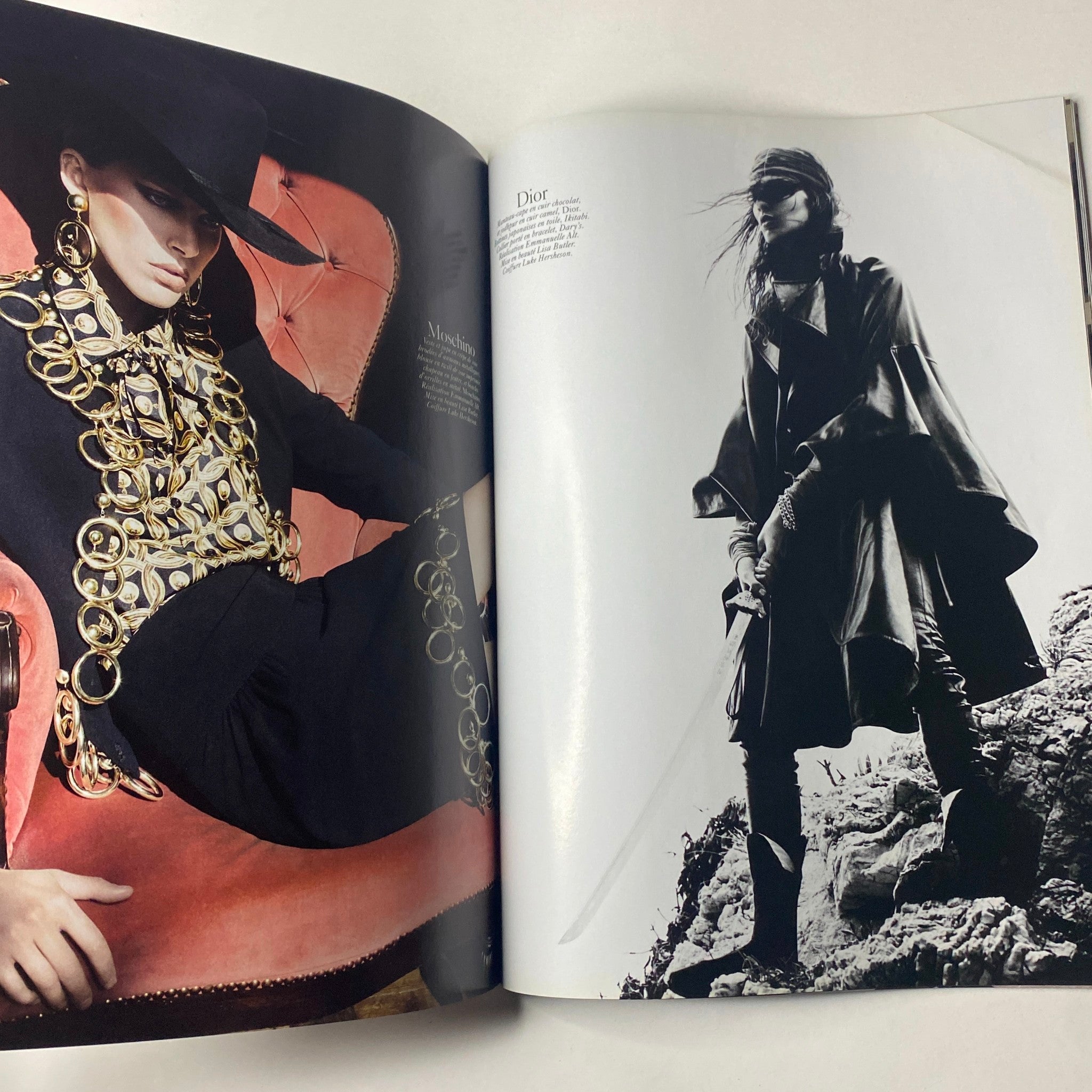 Fashion editorial spread from Vogue Paris Magazine August 2010 featuring model Freja Beha Erichsen in a dramatic black outfit with bold accessories, showcasing a striking editorial style. Vogue Paris Magazine – August 2010 No. 909.