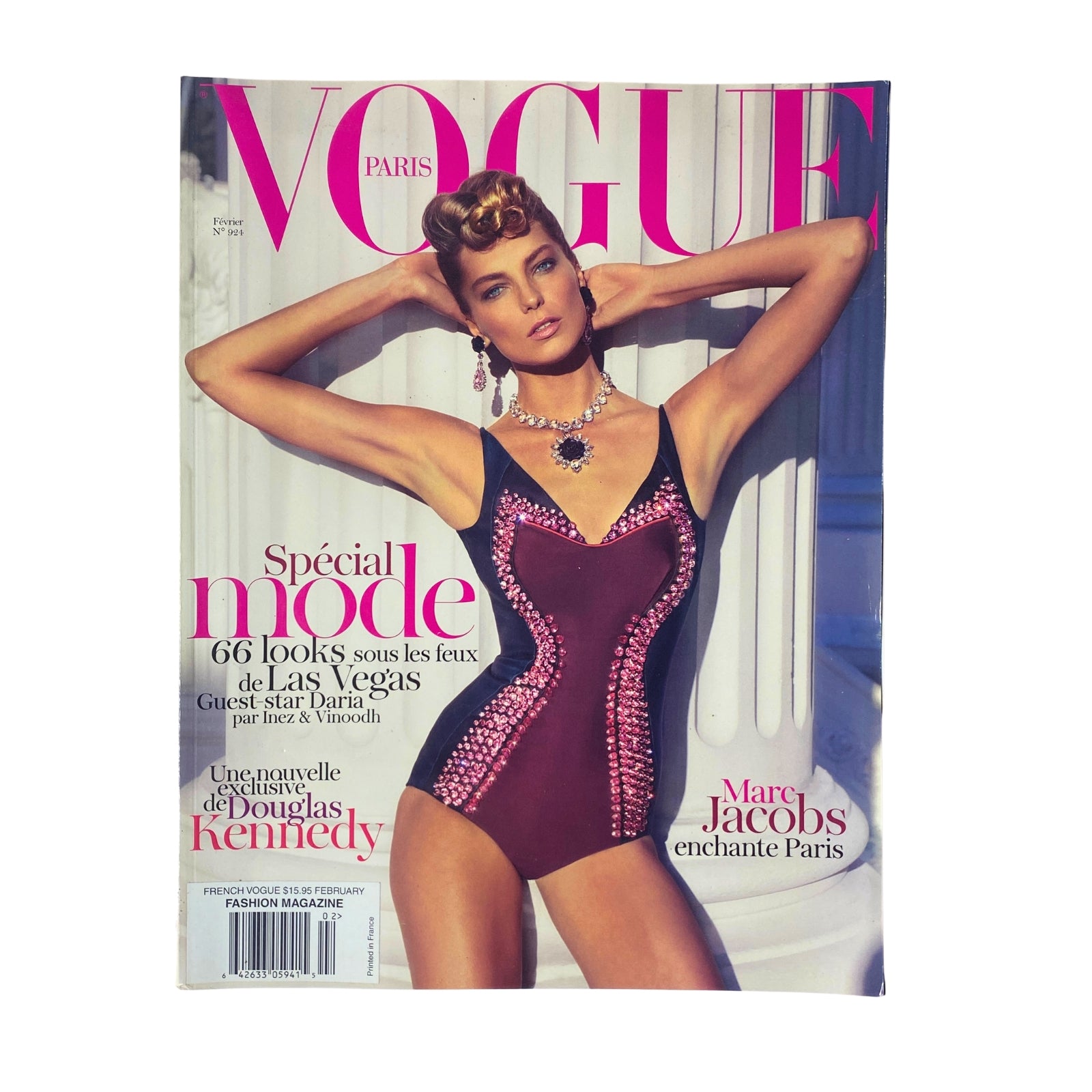 Cover of Vogue Paris Magazine February 2012 No. 924 featuring Daria Werbowy in a stylish swimsuit, highlighted for its vibrant colors and elegant design.