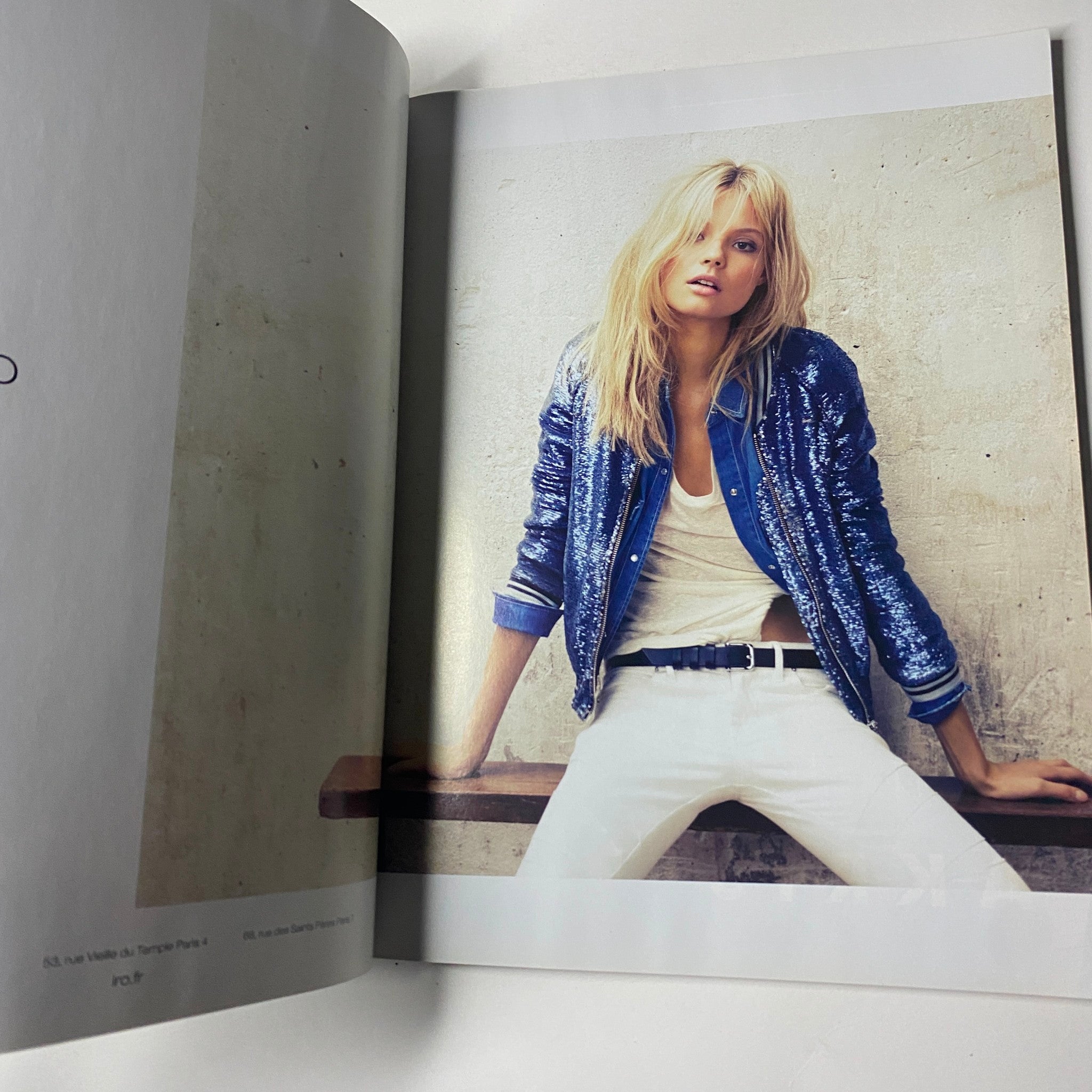 Vogue Paris Magazine February 2012 No. 924 Daria Werbowy Cover No Label VG featuring a model in a glittering blue bomber jacket and white pants, showcasing contemporary fashion styles.