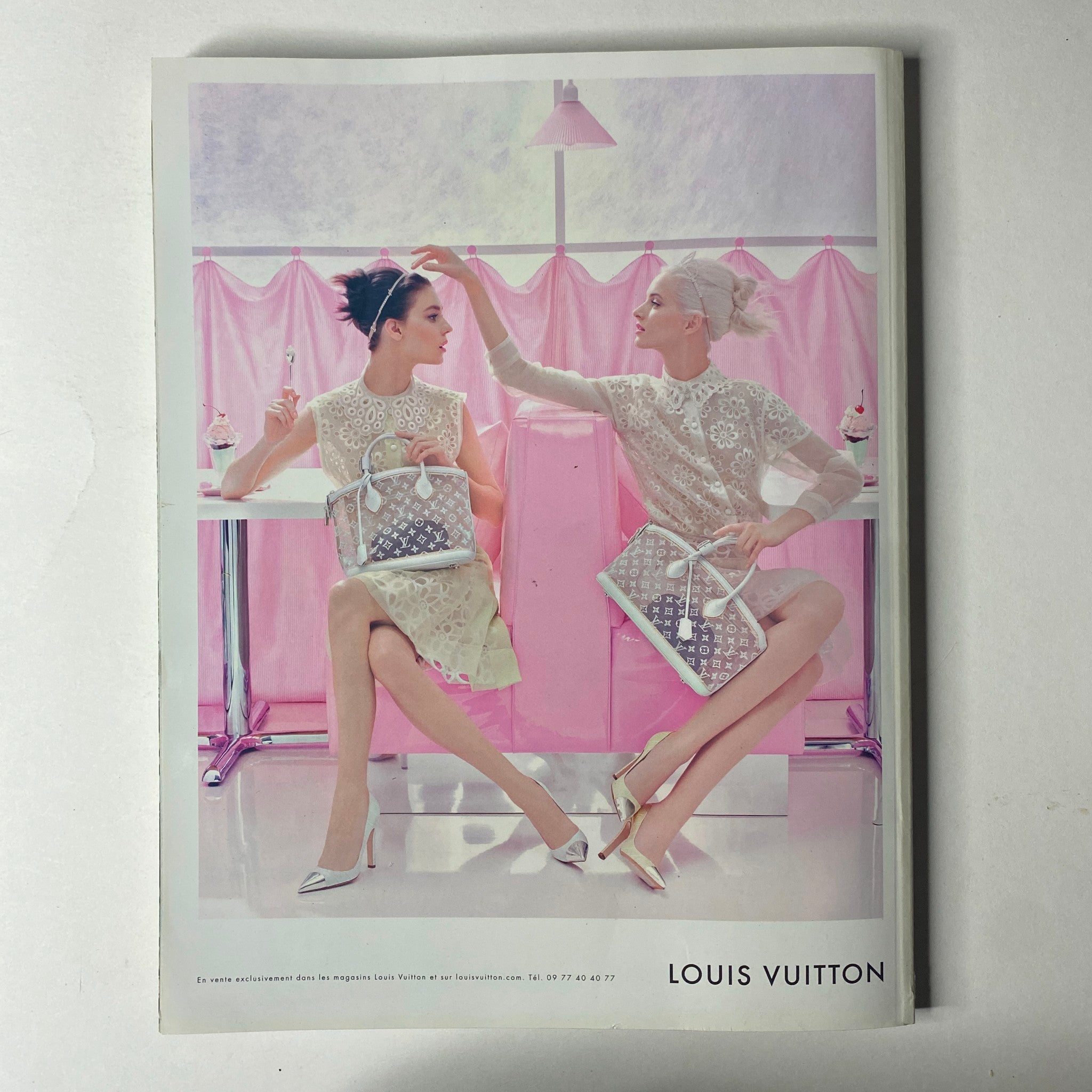 Vogue Paris Magazine February 2012 No. 924 Daria Werbowy Cover No Label VG showcasing two models in a glamorous setting, both in white outfits with designer Louis Vuitton bags, highlighting luxury fashion trends.