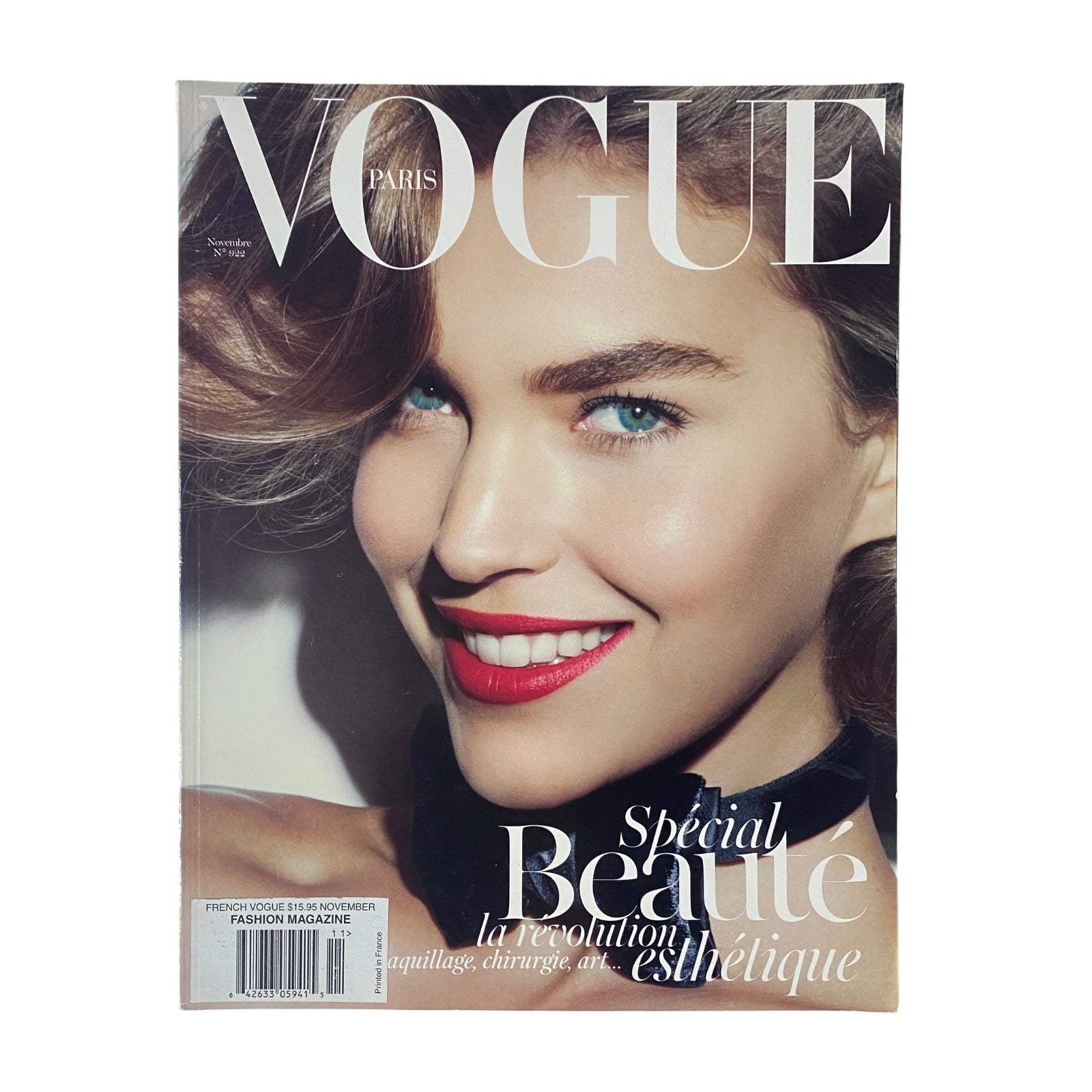 Cover of Vogue Paris Magazine November 2011 No. 922 featuring Arizona Muse with striking blue eyes and vibrant red lips, showcasing beauty and fashion details.