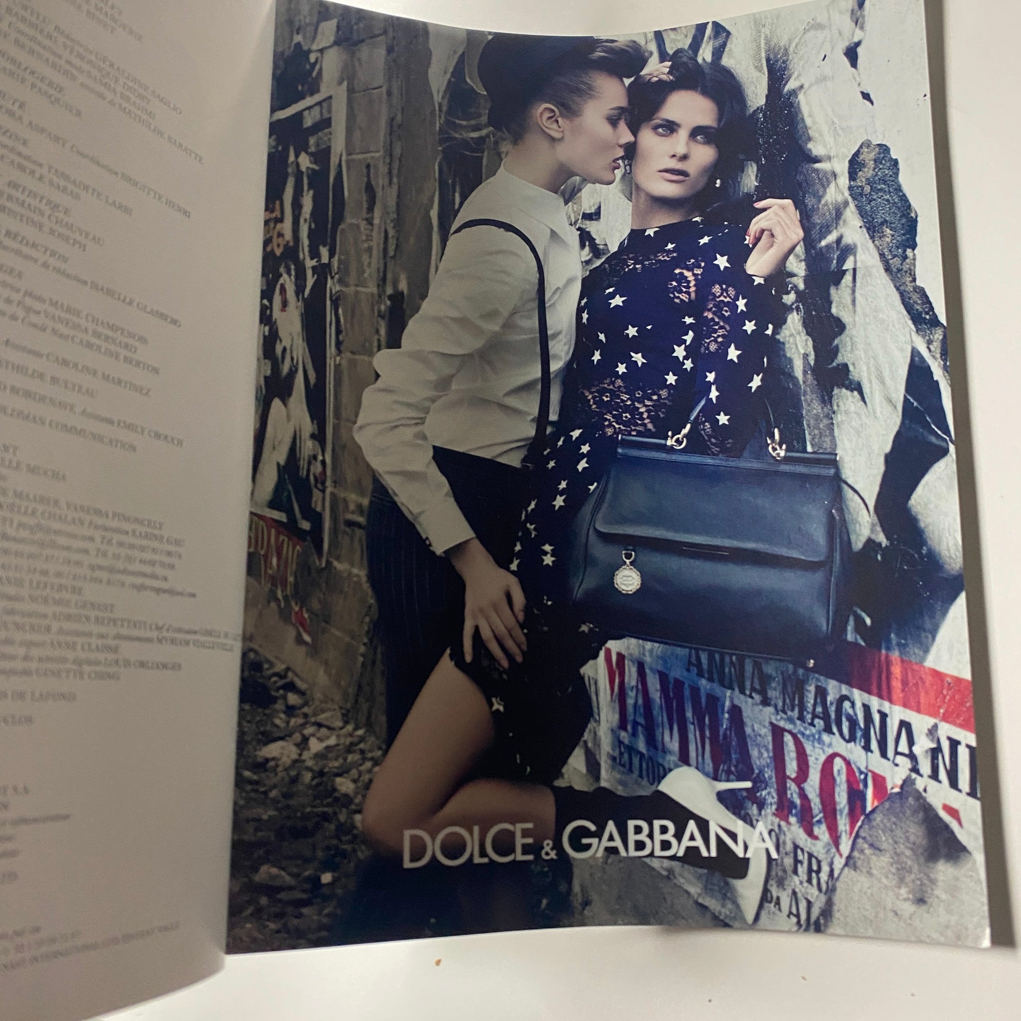 Dolce & Gabbana fashion spread featuring models styled in chic attire, highlighted in Vogue Paris Magazine November 2011 No. 922.