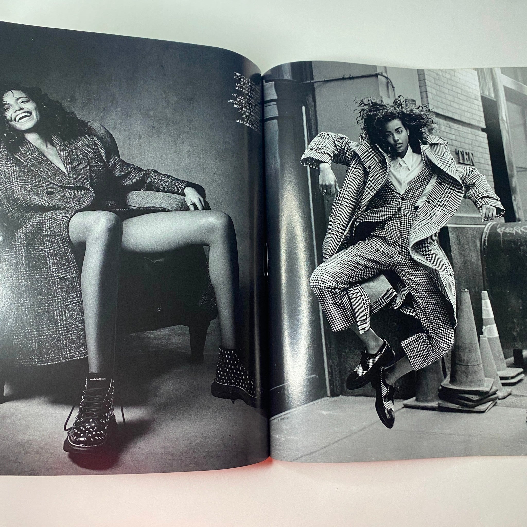 Double-page spread from Vogue British Magazine November 2019 showcasing a black and white fashion shoot with models in stylish outfits, highlighting bold fashion choices.