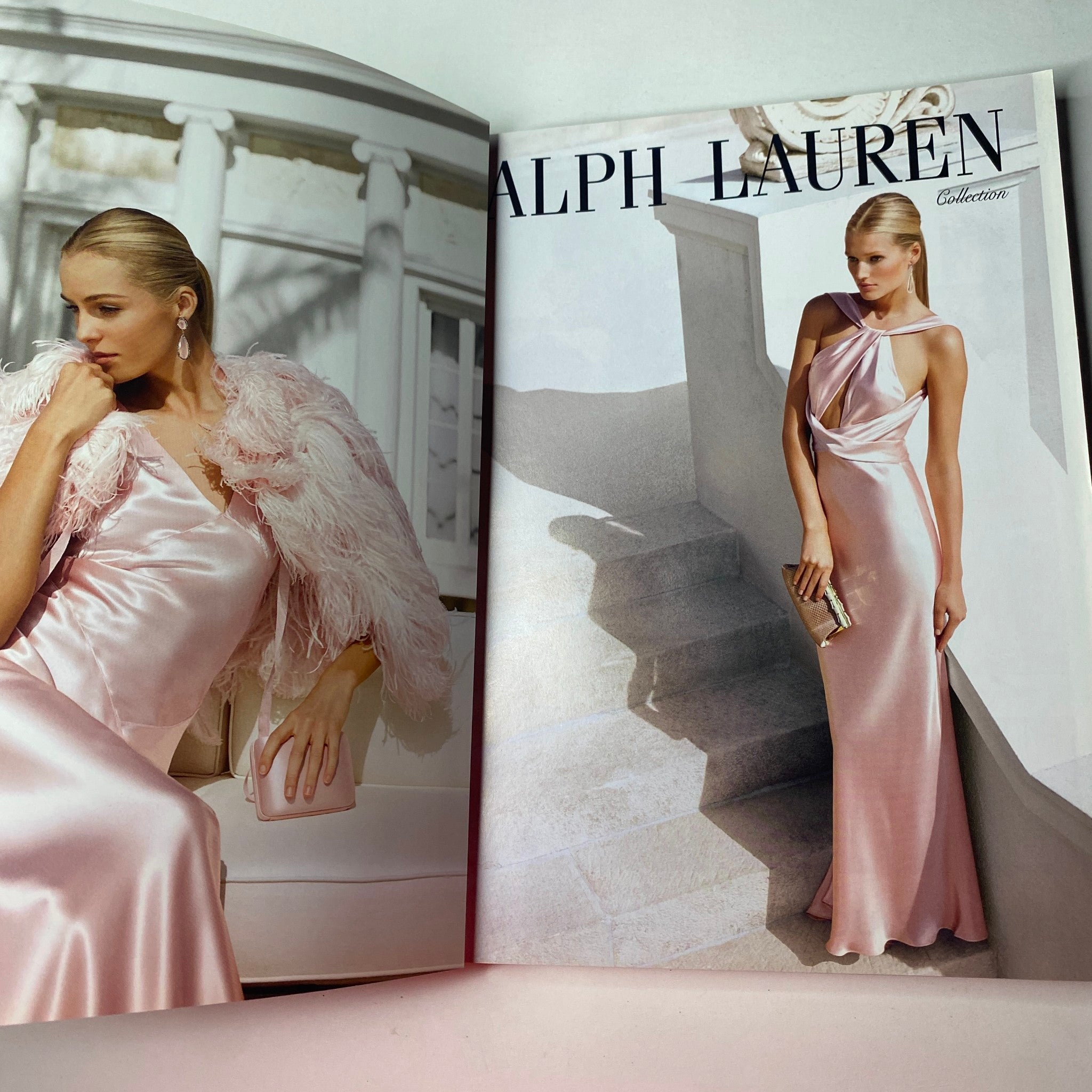 Fashion spread from Vogue British Magazine May 2012 showcasing elegant designs from the Alpha Lauren collection, including luxurious silk dresses.