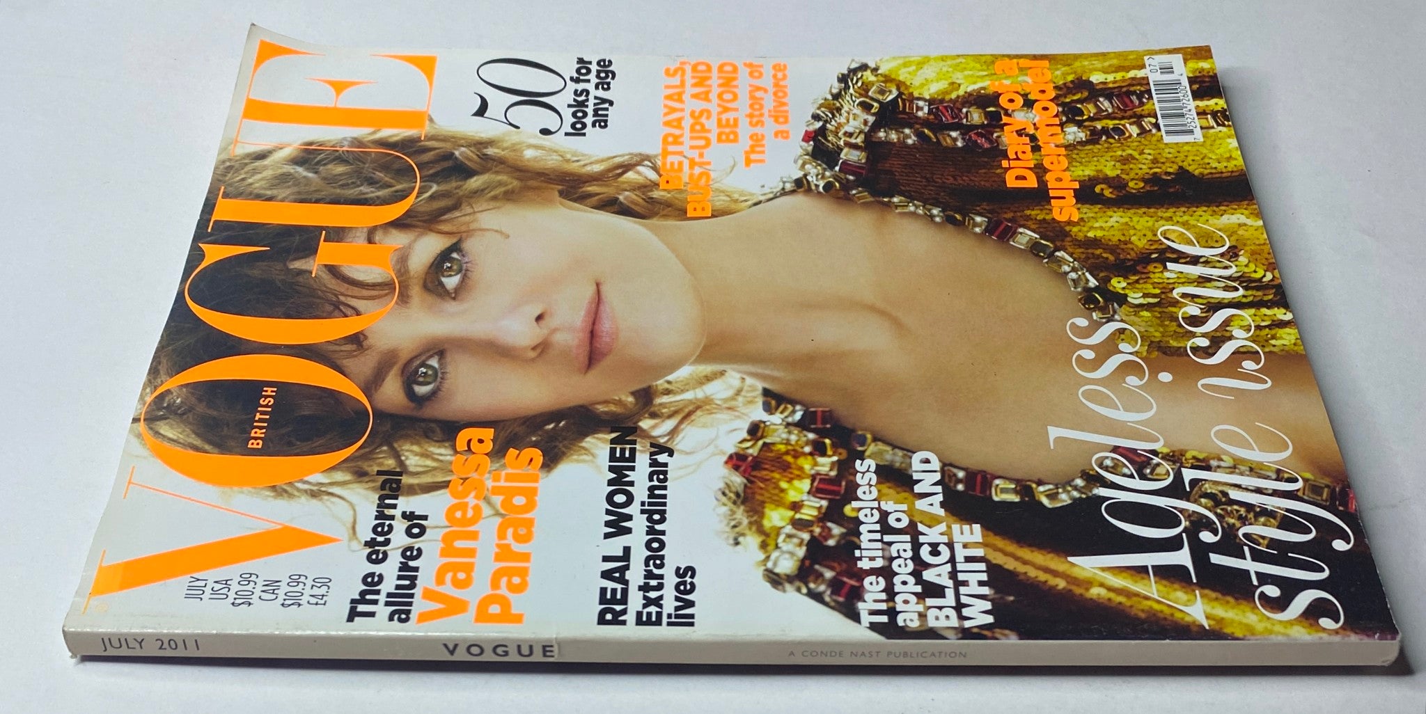 Vogue British Magazine July 2011 cover with Vanessa Paradis, showcasing her captivating look and the issue's focus on fashion and beauty.