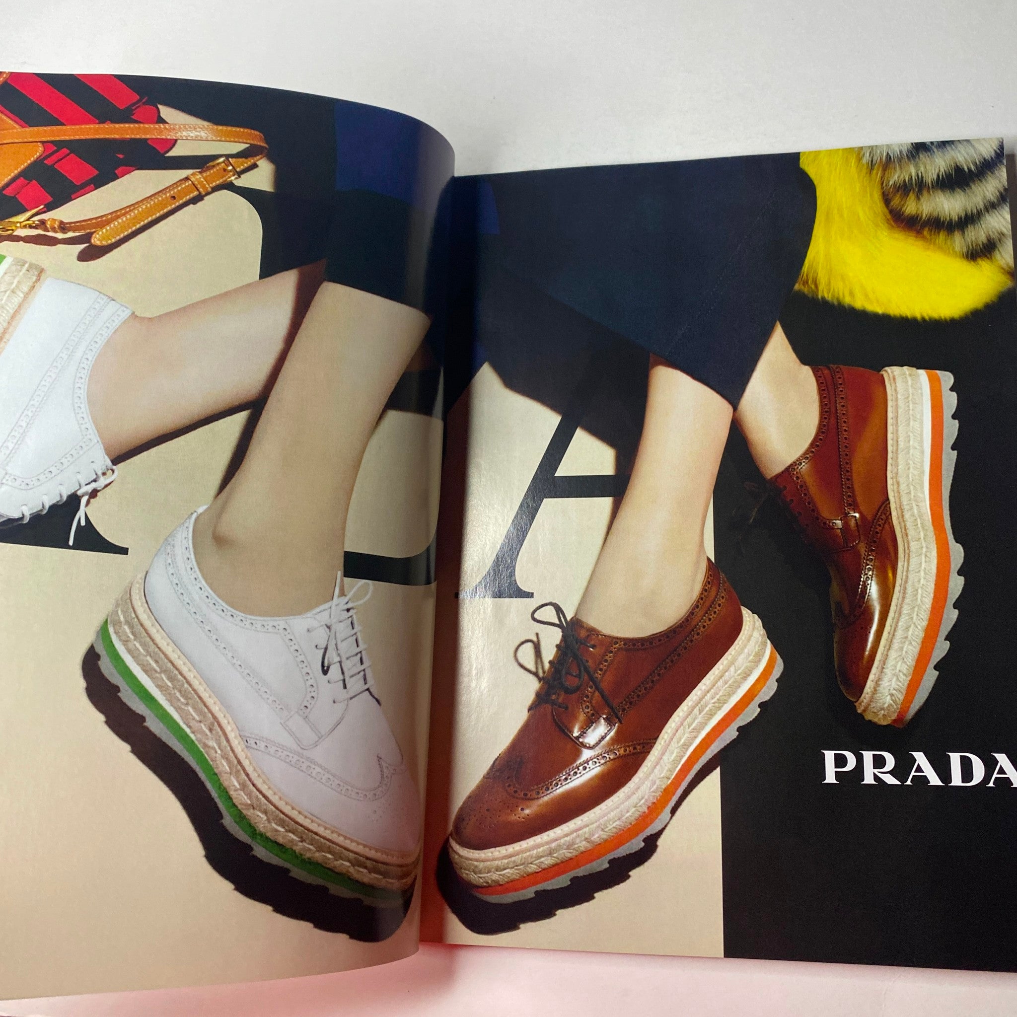 Fashion spread in Vogue British Magazine June 2011 showcasing Prada shoes, highlighting current footwear trends.