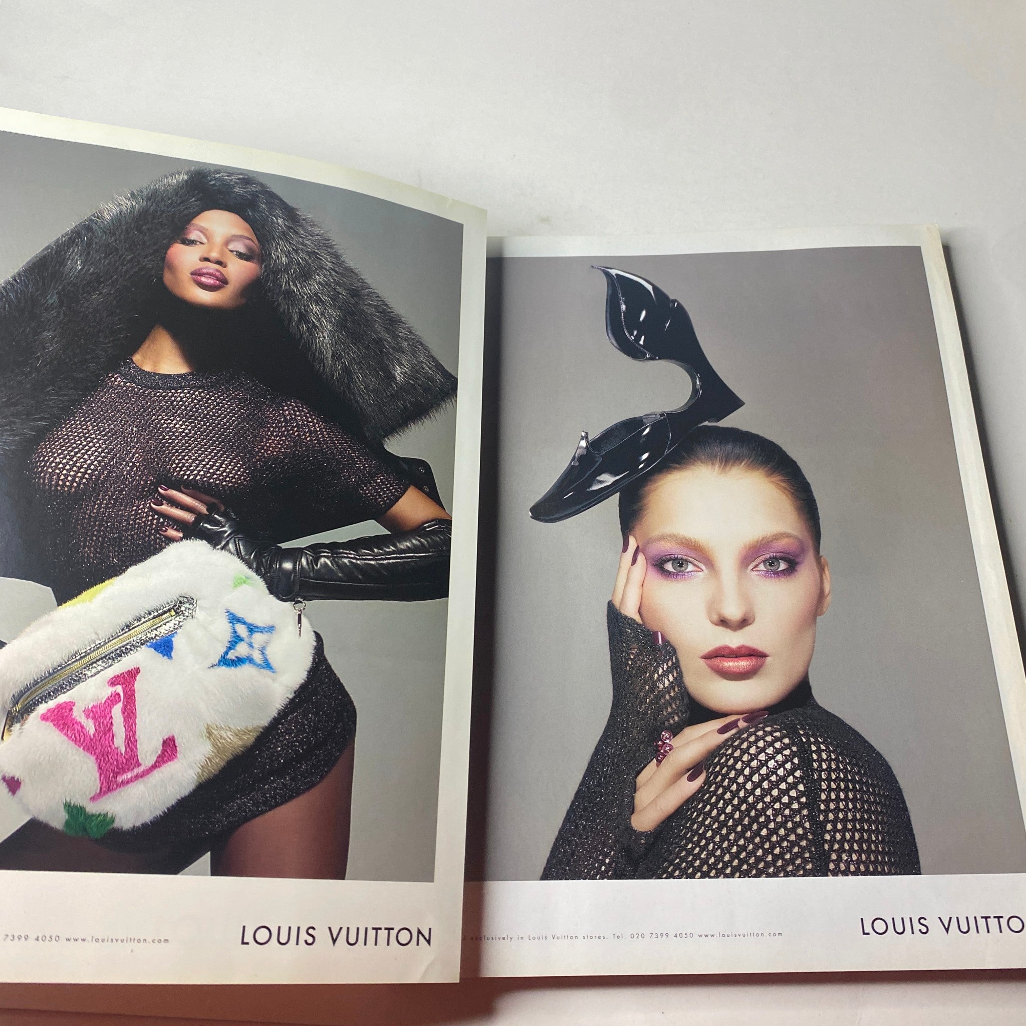 An advertisement from Vogue British Magazine November 2006 showcasing Louis Vuitton products, focusing on high-fashion imagery and accessories.