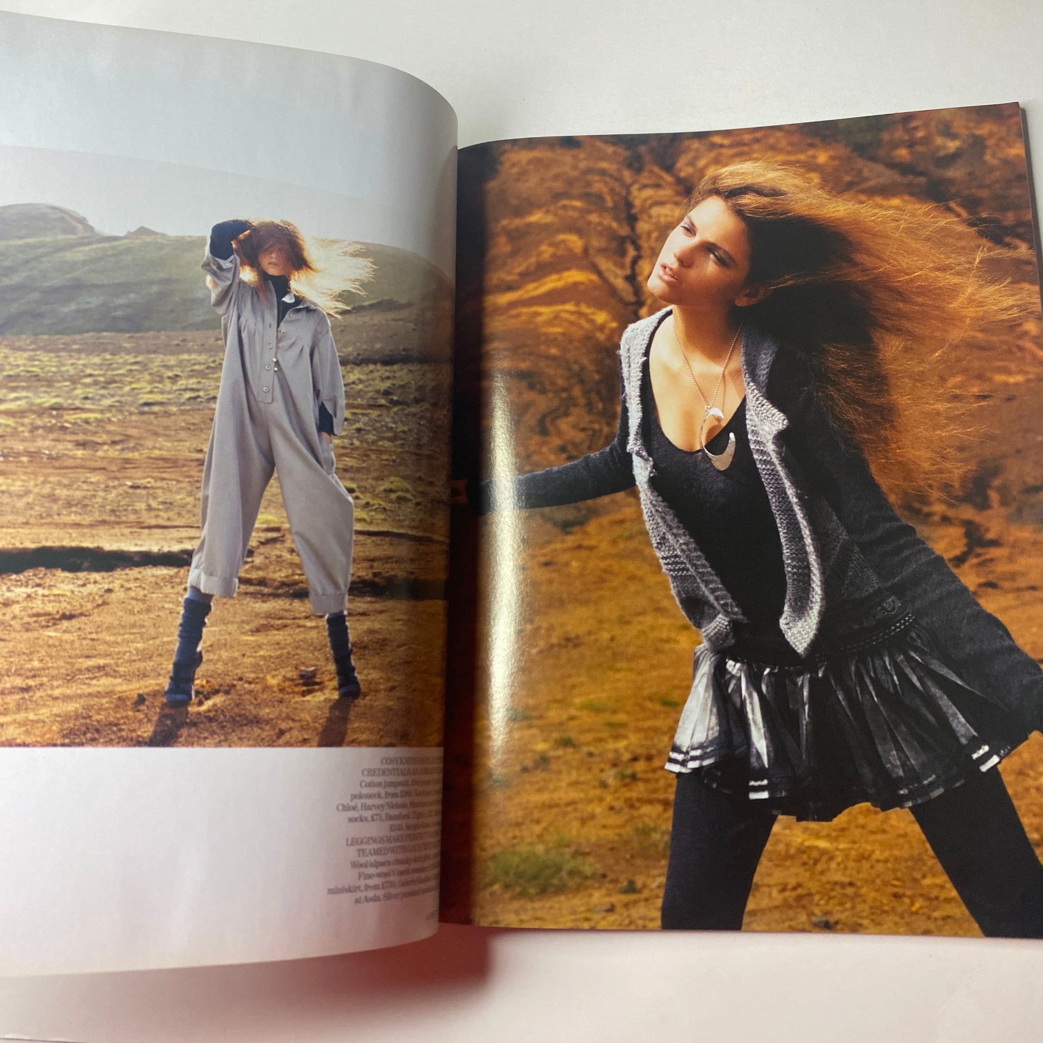 Fashion editorial from Vogue British Magazine November 2006 featuring models in dramatic poses with flowing hair and stylish outfits, showcasing seasonal fashion trends.