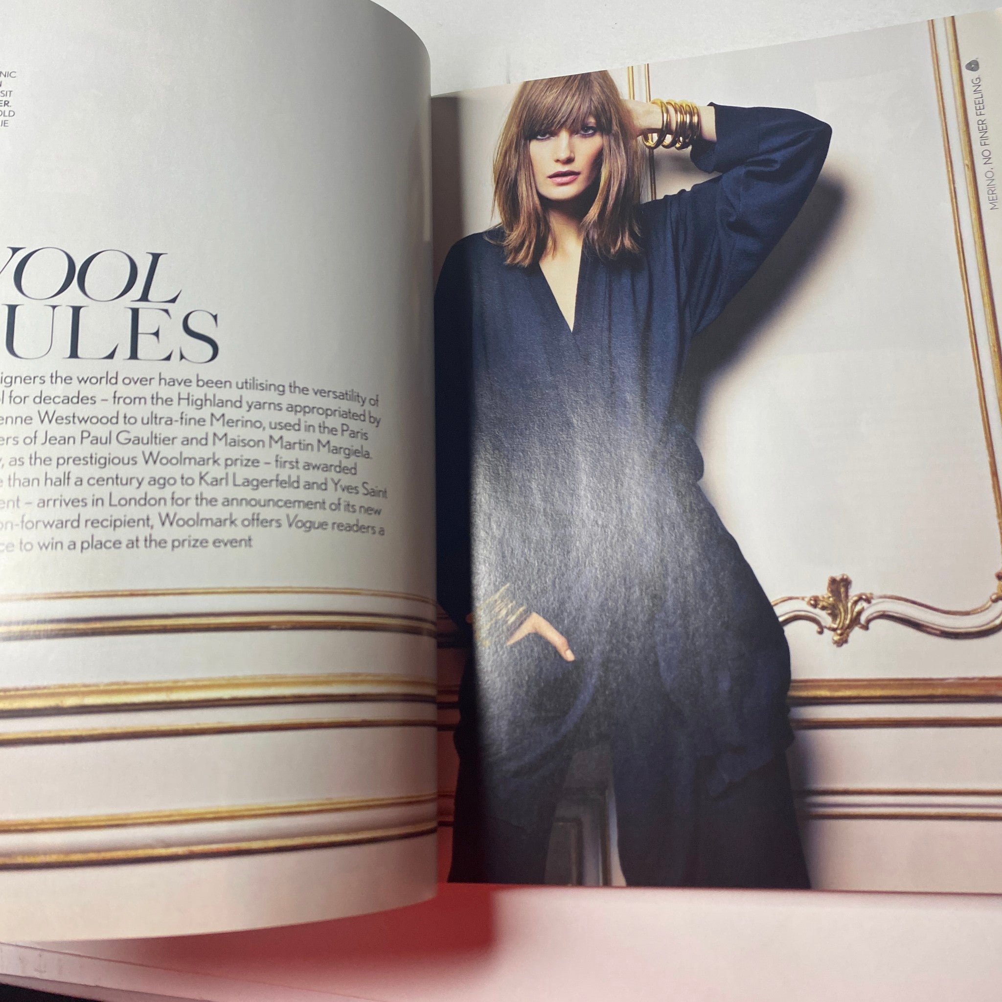 Inside Vogue British Magazine January 2013, highlighting a sophisticated model in luxurious attire, emphasizing high fashion editorial style.
