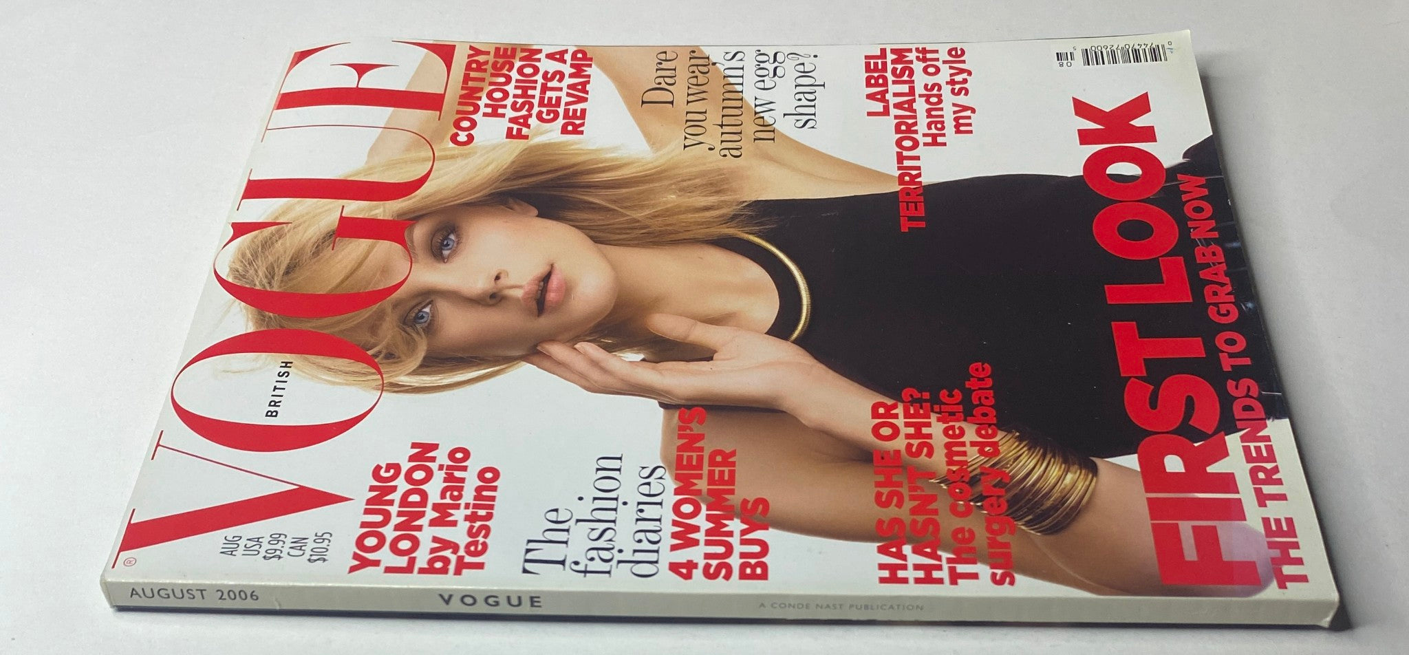 Vogue British Magazine August 2006, Jessica Stam on the cover, showcasing beauty and fashion insights in a stylish layout.