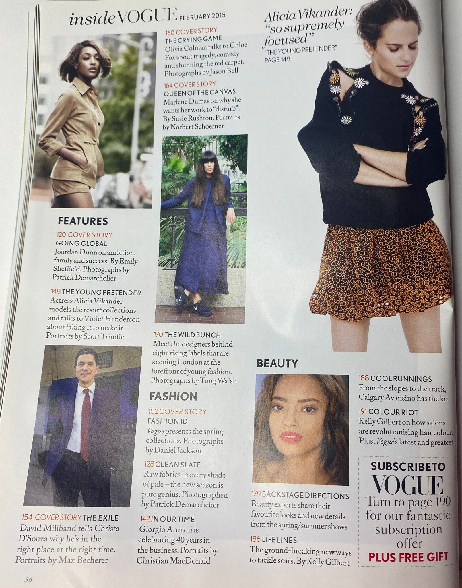 Inside pages of Vogue British Magazine February 2015, featuring articles on Jourdan Dunn, Alicia Vikander, and David Miliband, with various fashion highlights.