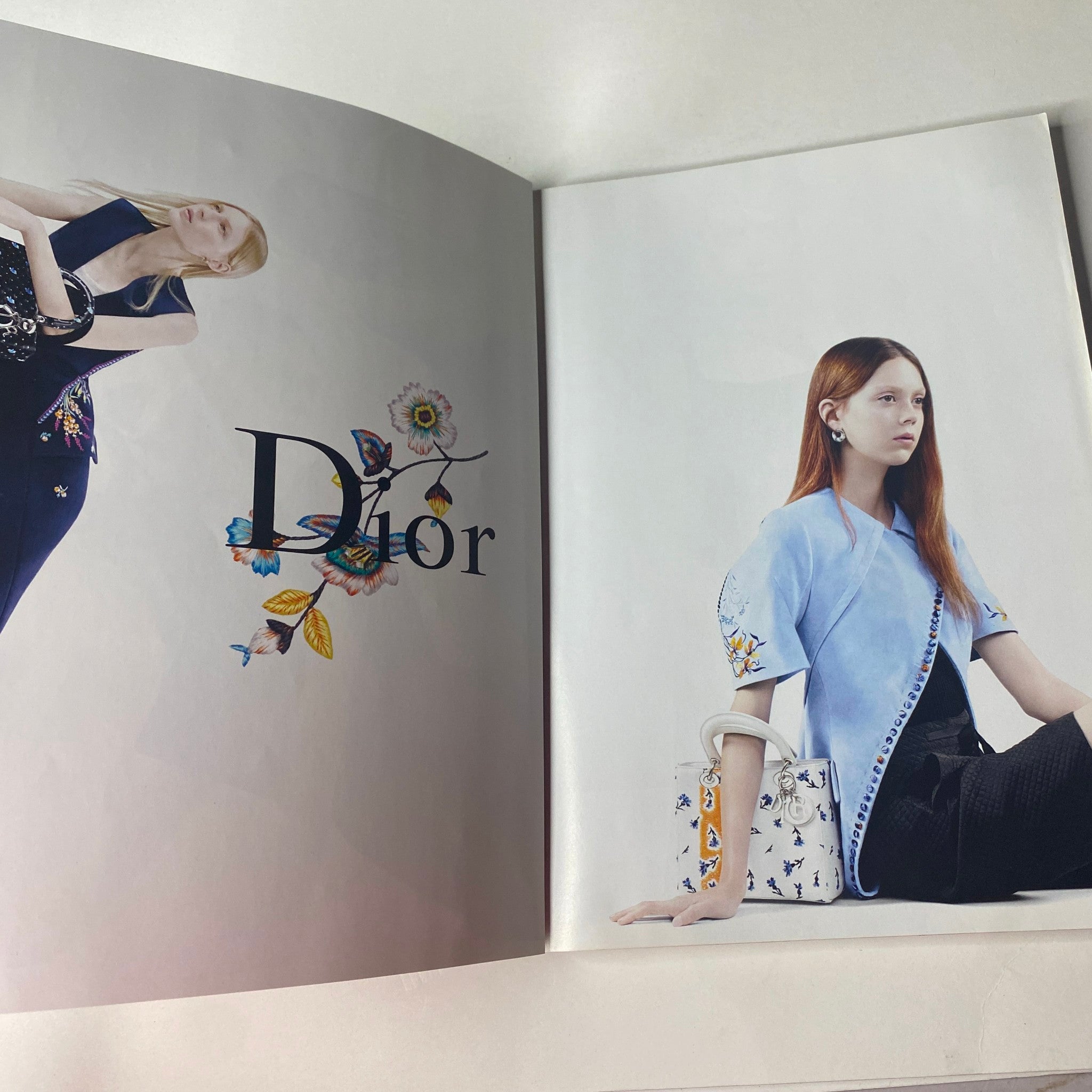 Vogue British Magazine February 2015 featuring a high-fashion editorial spread on Dior with floral designs and intricate embellishments.