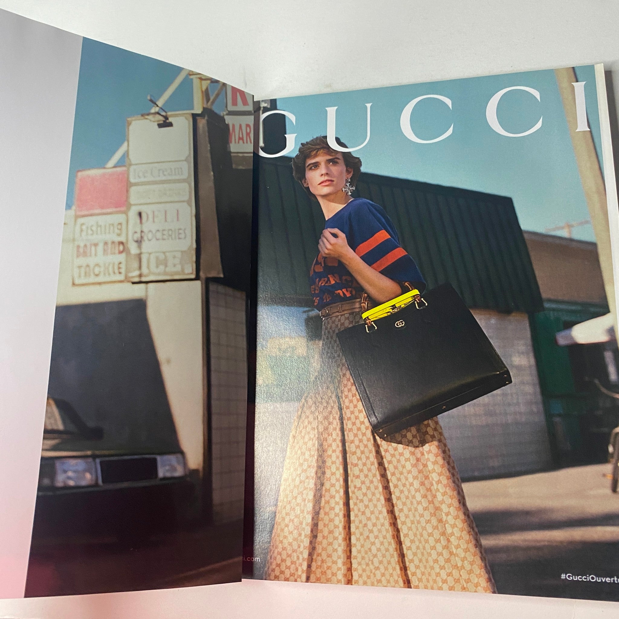 Gucci advertisement spread in Vogue British Magazine August 2021 displaying a model with a handbag in a vintage setting. Title: Vogue British Magazine August 2021 Margot Robbie Cover No Label VG.