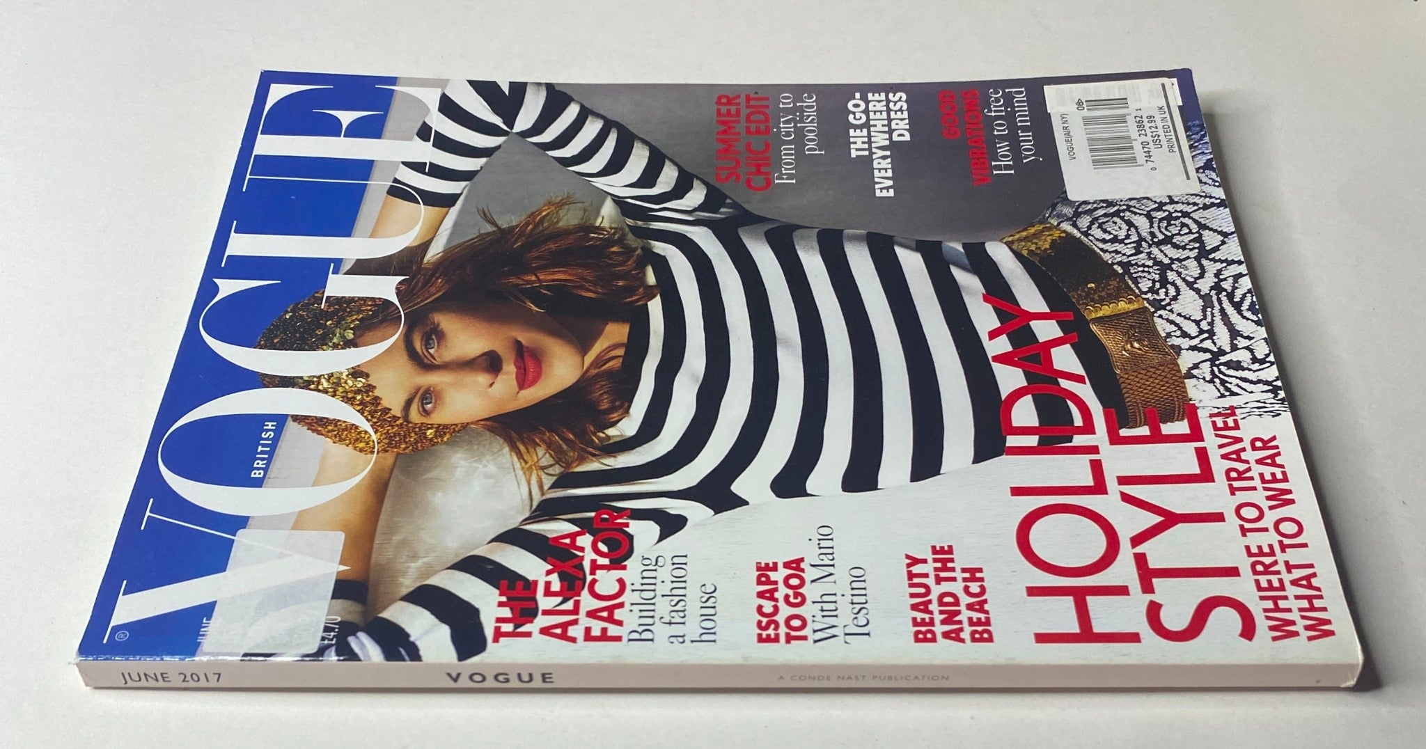Vogue British Magazine June 2017 with a close-up of Alexa Chung on the cover, highlighting her stylish attire for a summer-themed edition.