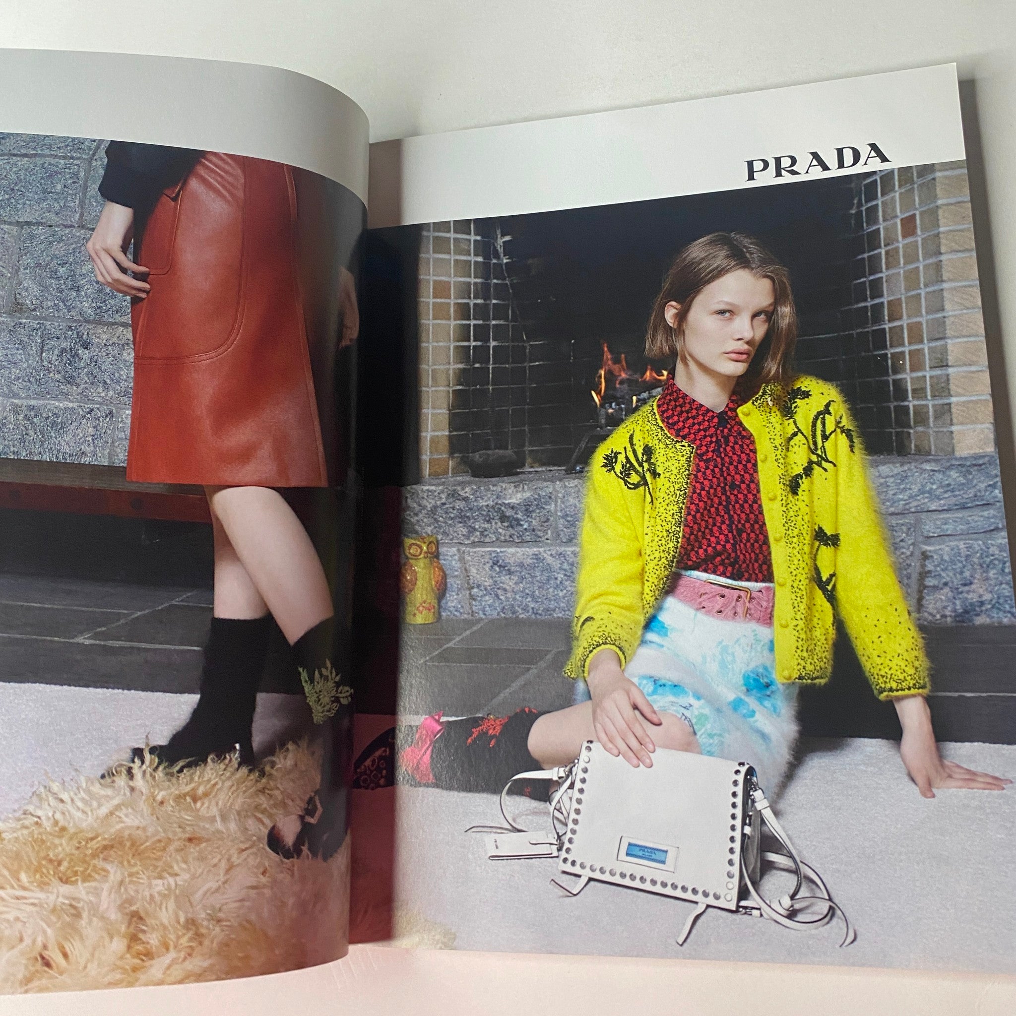 Fashion spread from Vogue British Magazine June 2017 featuring a model in a Prada outfit, showcasing vibrant colors and contemporary design.