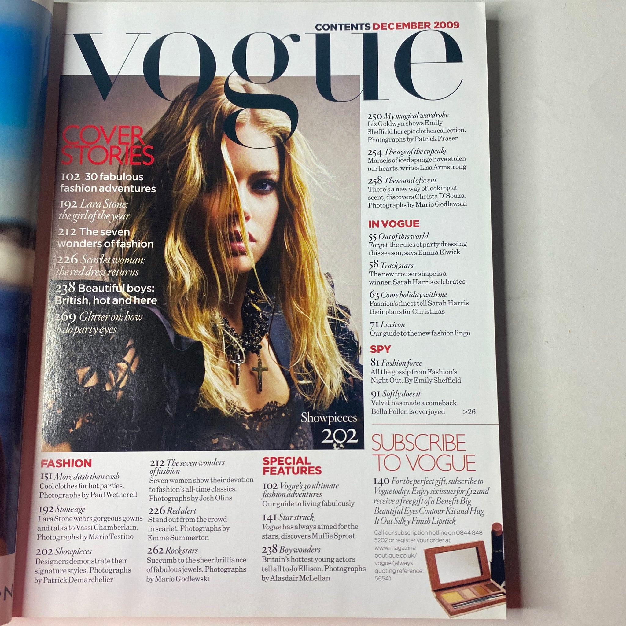 Contents page of Vogue British Magazine December 2009, detailing cover stories and features including '30 Fabulous Fashion Adventures', 'Lovely Boys', and 'Scarlet Woman' with a vibrant layout.