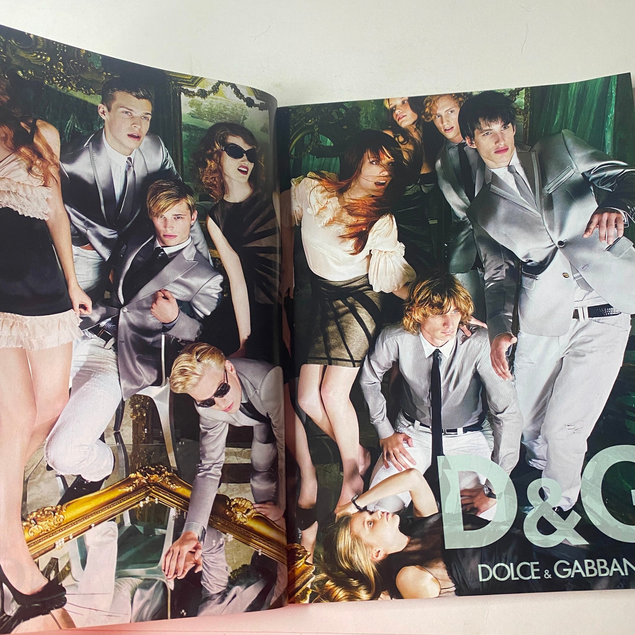 Vogue British Magazine June 2008 Agyness Deyn Cover features a fashion editorial with models styled in silver suits by Dolce & Gabbana, offering a glamorous representation of summer fashion.