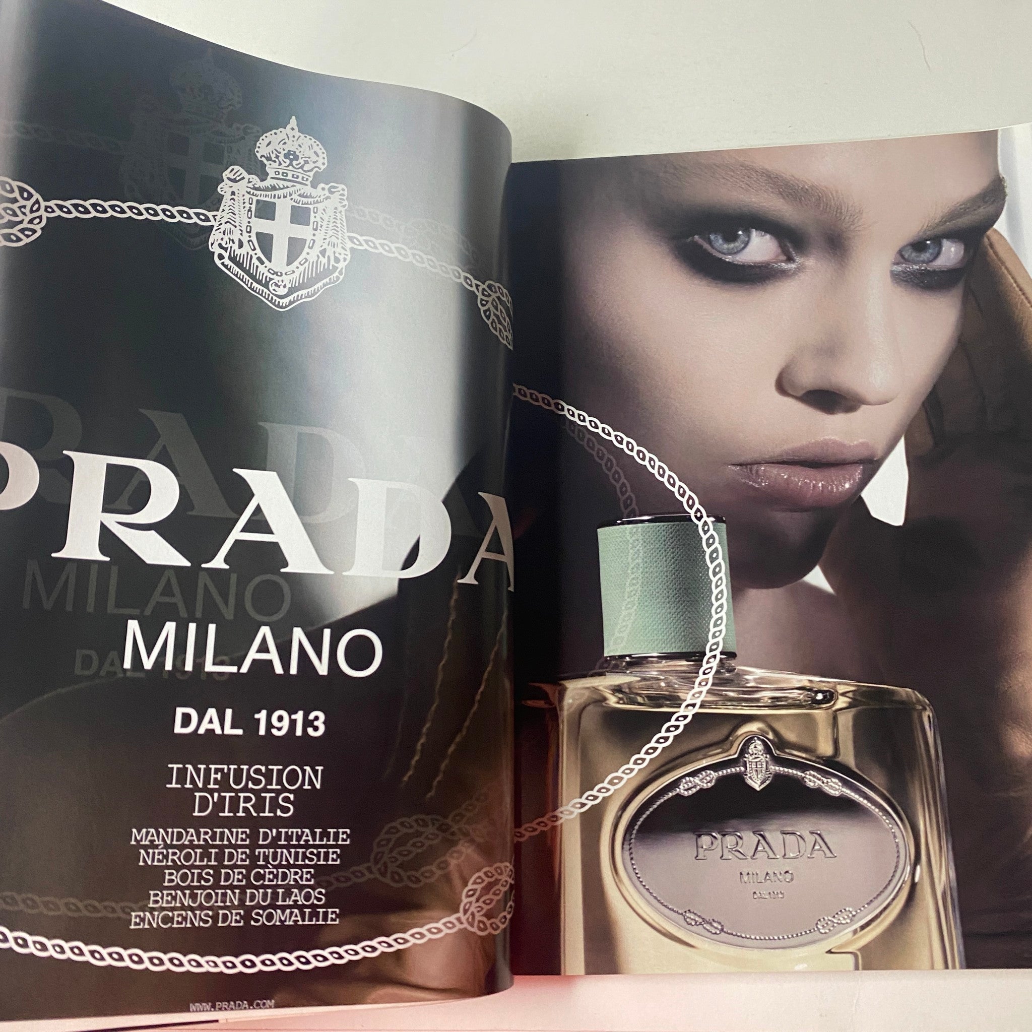 Vogue British Magazine June 2008 Agyness Deyn Cover showcases a striking beauty advertisement for Prada, featuring model with bold eye makeup and the iconic scent, highlighting luxury and elegance.