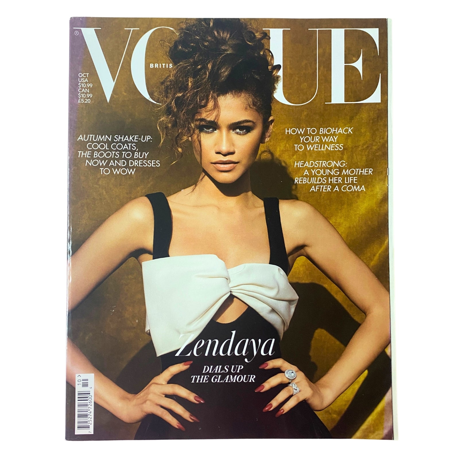 Cover of Vogue British Magazine October 2021 featuring Zendaya in a stunning dress by Giambattista Valli, highlighting the theme 'Dials Up The Glamour'.