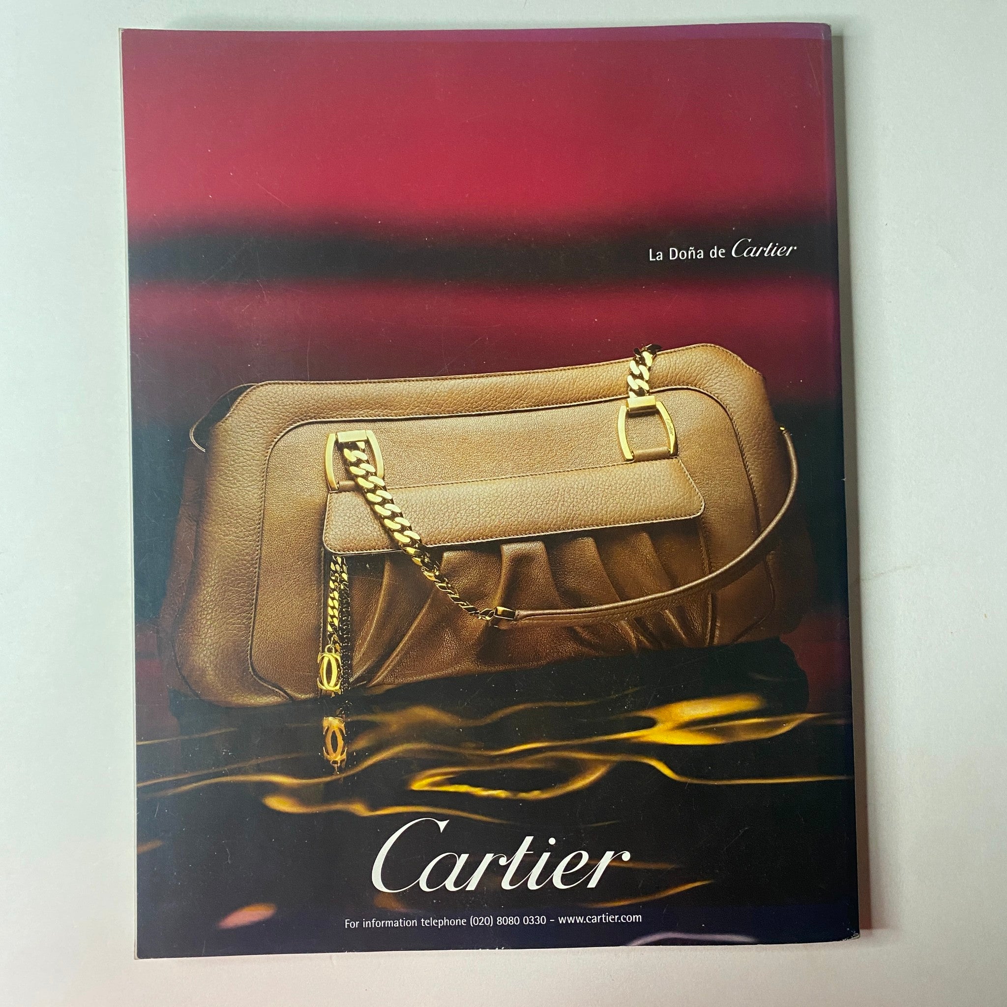 Vogue British Magazine January 2007 Kate Winslet Cover No Label featuring a Cartier advertisement spotlighting an elegant handbag against a stylish backdrop.