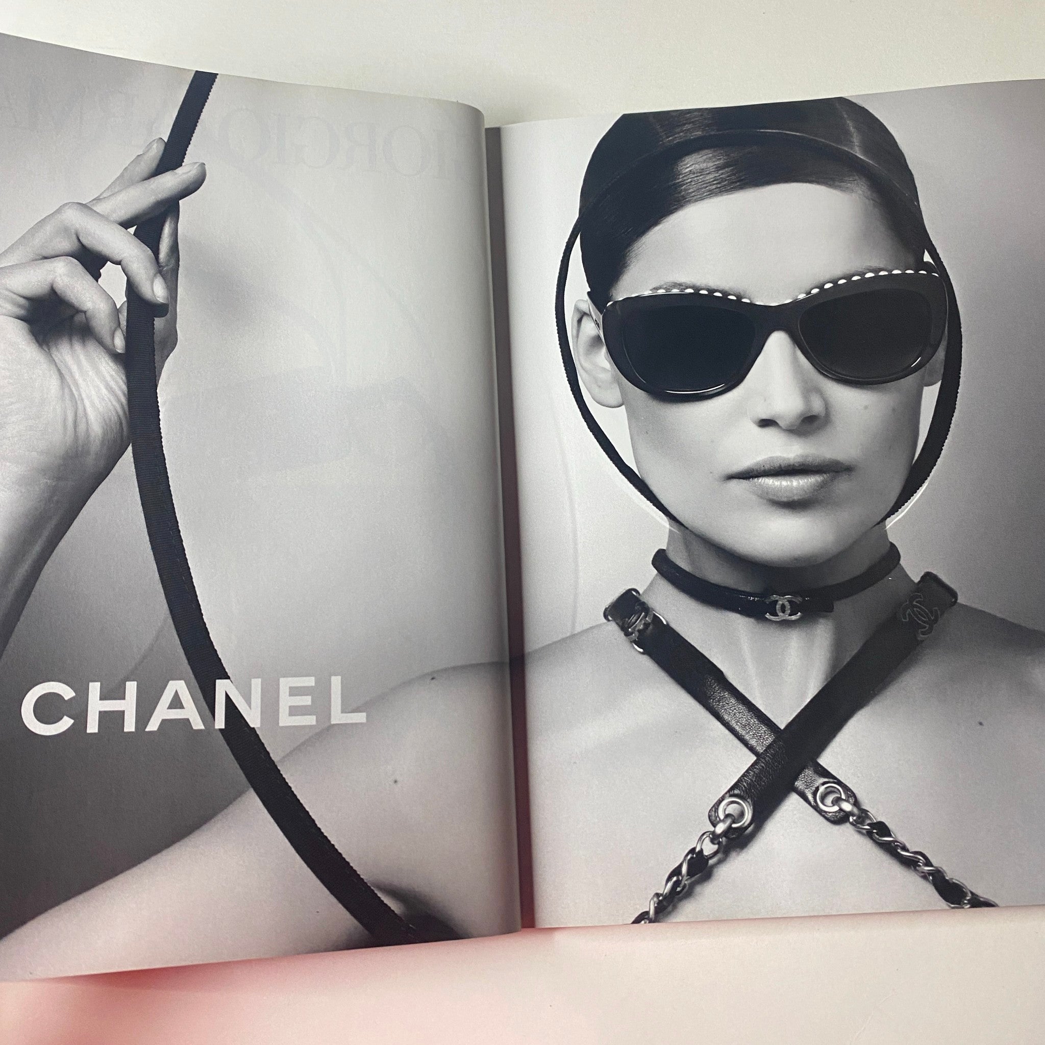 Open page from Vogue British Magazine June 2013 showcasing a Chanel eyewear advertisement featuring a model in chic sunglasses, aligning with the magazine's focus on high fashion.