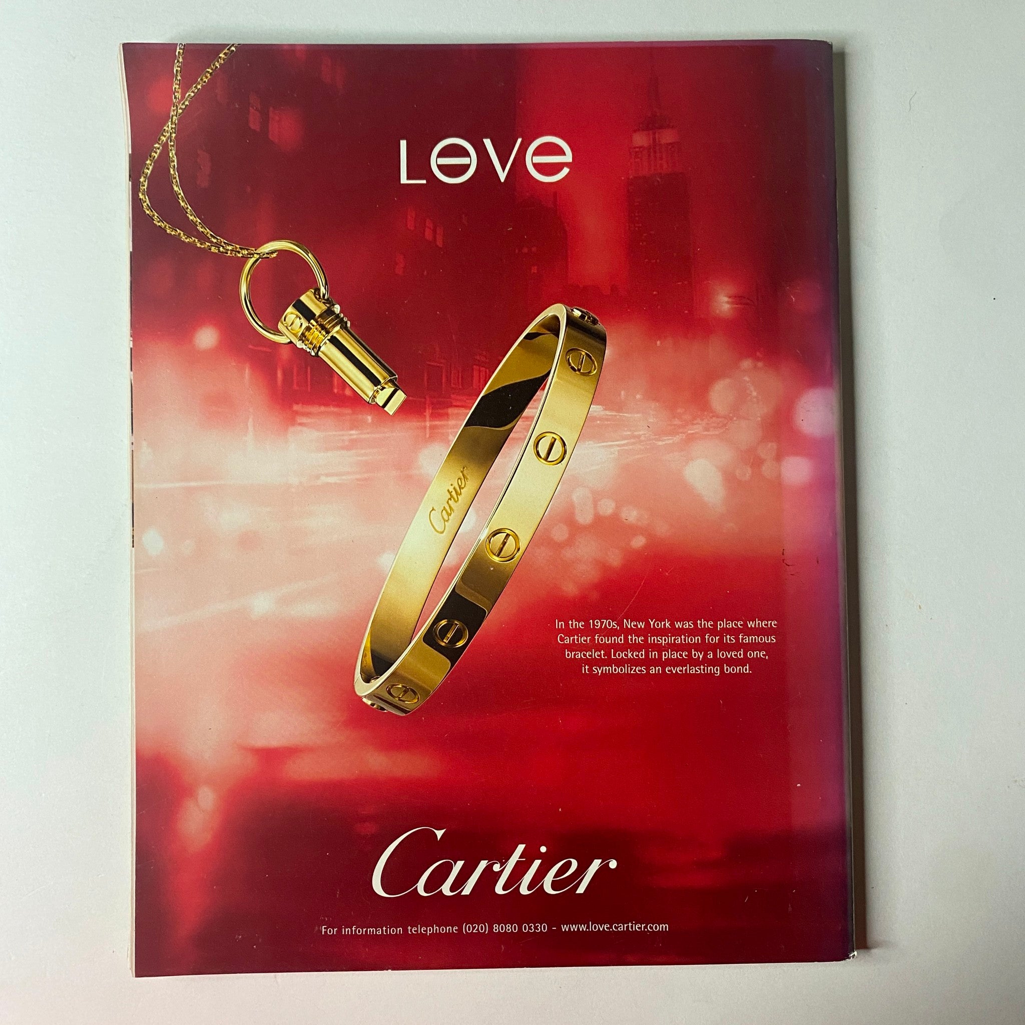 Vogue British Magazine July 2006 advertisement for Cartier showcasing luxury jewelry, capturing the essence of New York glamour.