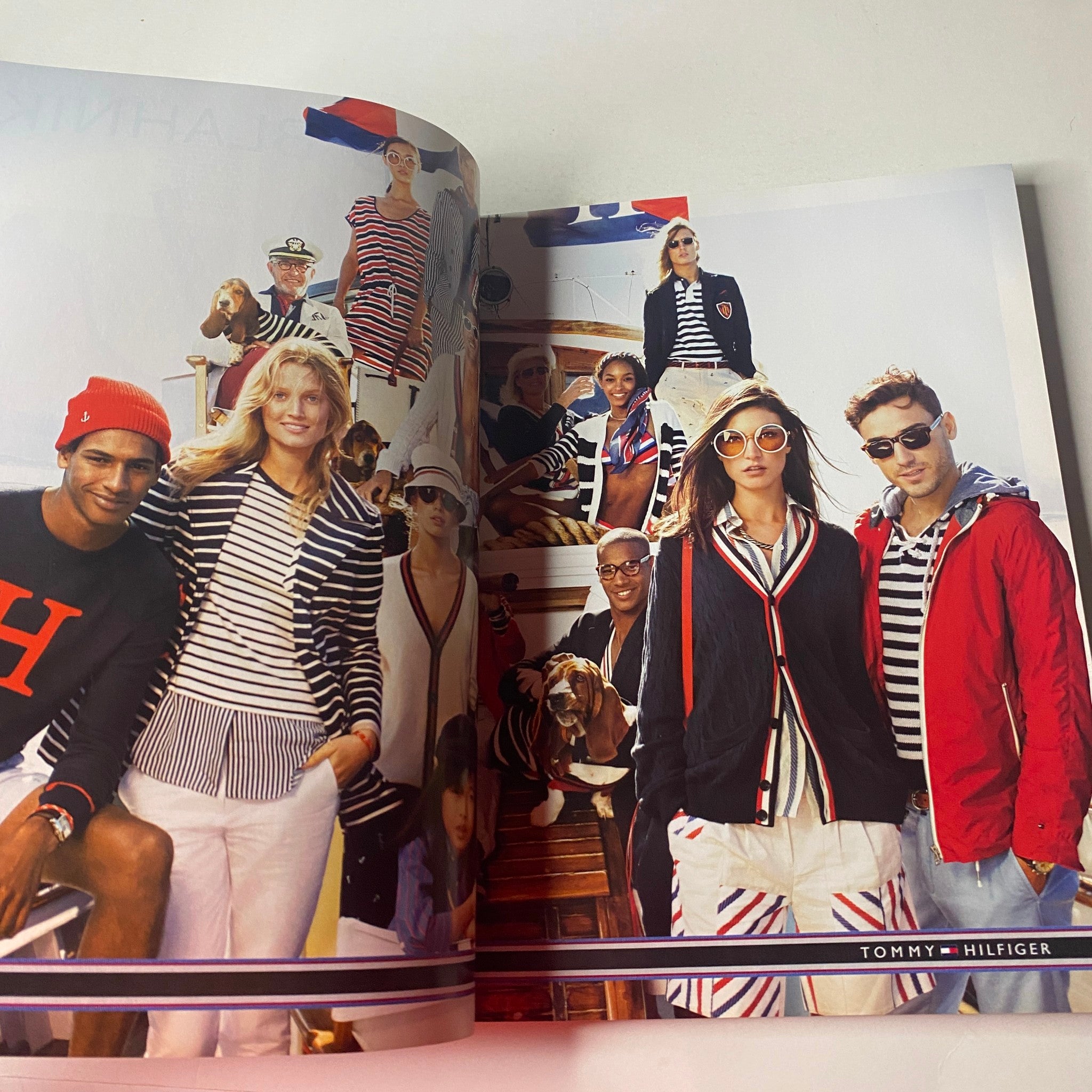 Vogue British Magazine March 2013 Cara Delevingne Cover featuring a vibrant Tommy Hilfiger fashion shoot with models dressed in nautical-themed apparel.