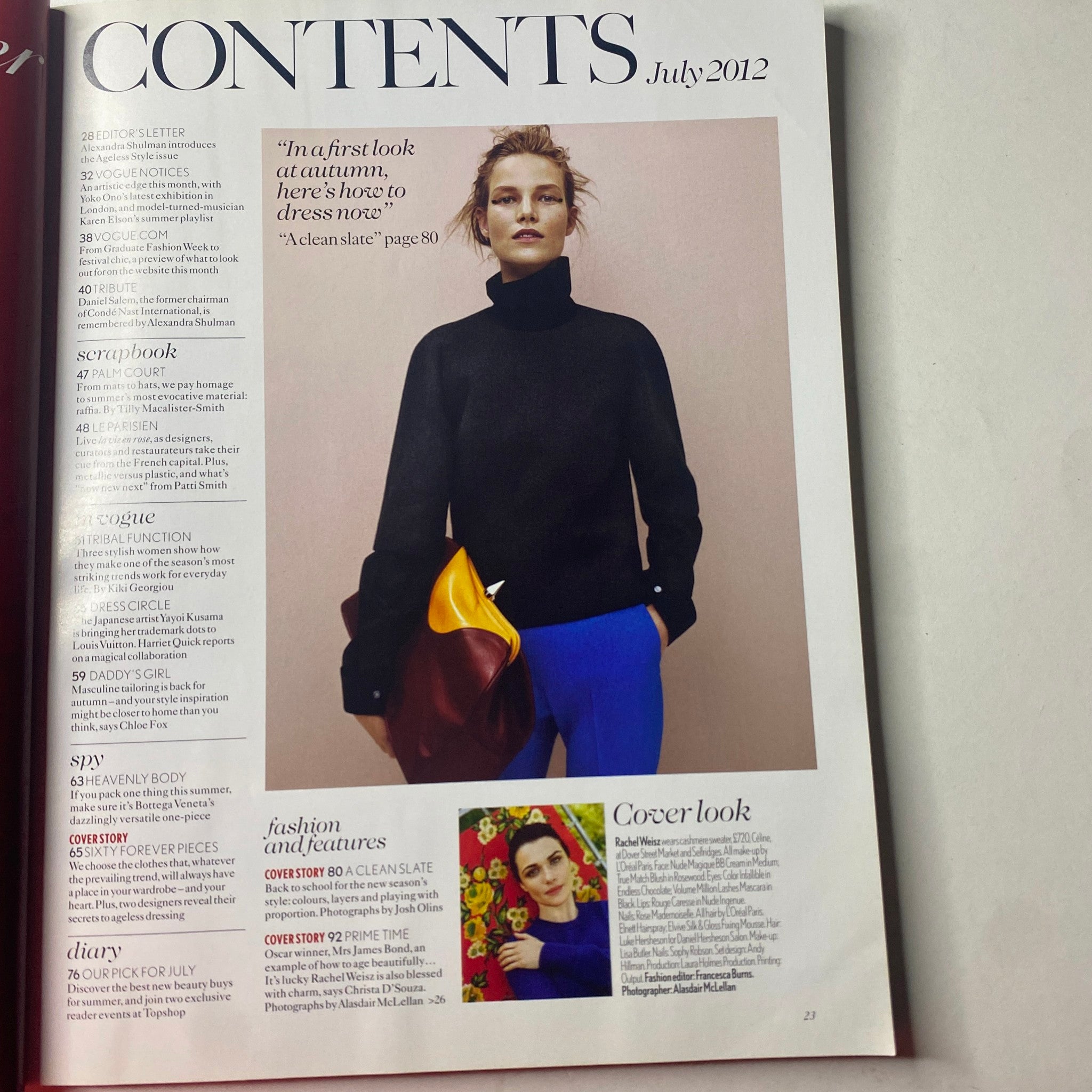 Vogue British Magazine July 2012 Rachel Weisz Cover Contents Page featuring a model in a black turtleneck and colorful trousers.