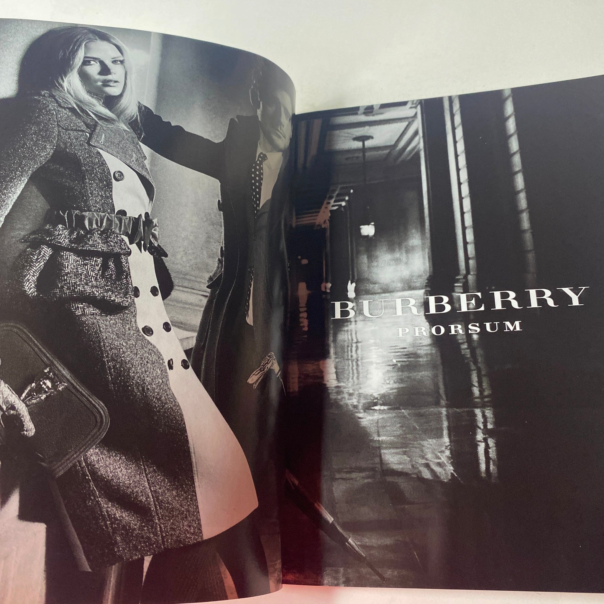 Vogue British Magazine July 2012 Rachel Weisz Cover advertisement for Burberry Prorsum featuring a model in striking fashion.