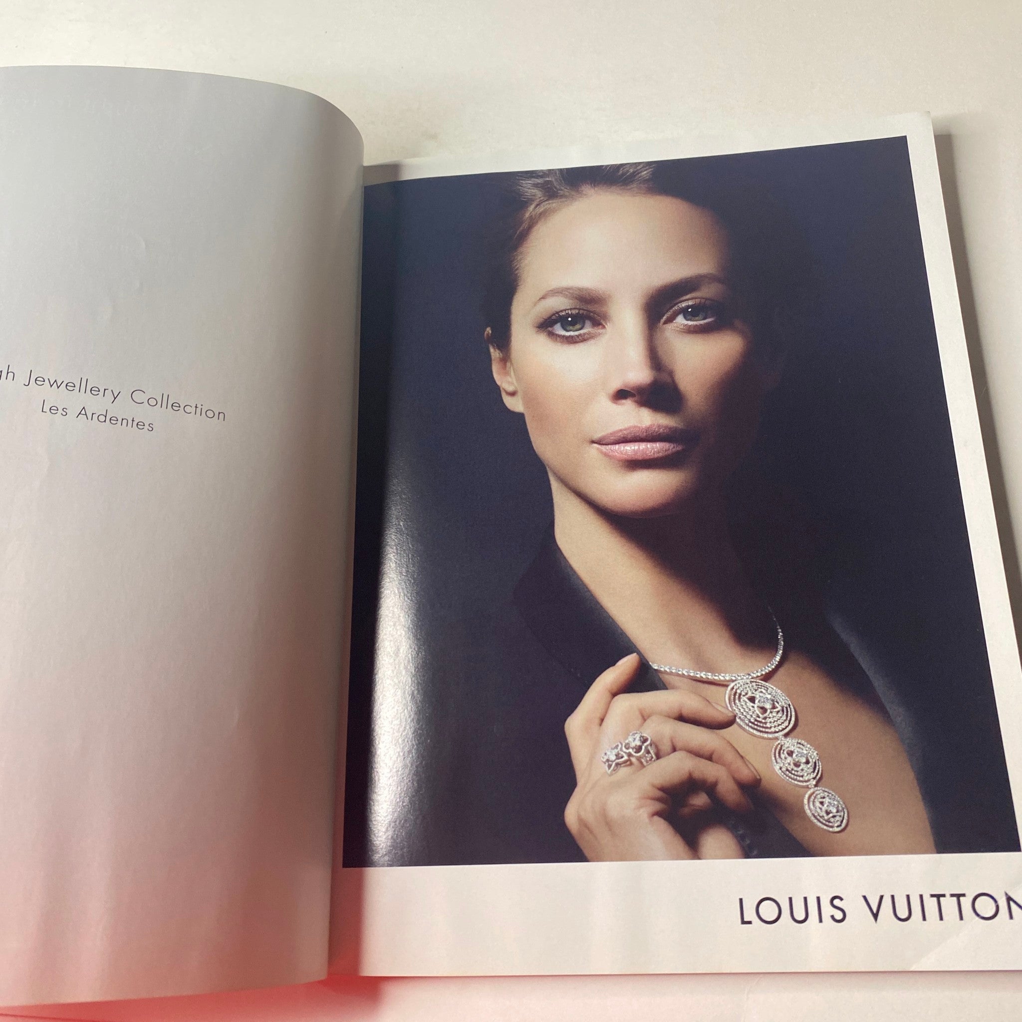 Vogue British Magazine July 2012 Rachel Weisz Cover featuring an advertisement for Louis Vuitton showcasing elegant jewelry.