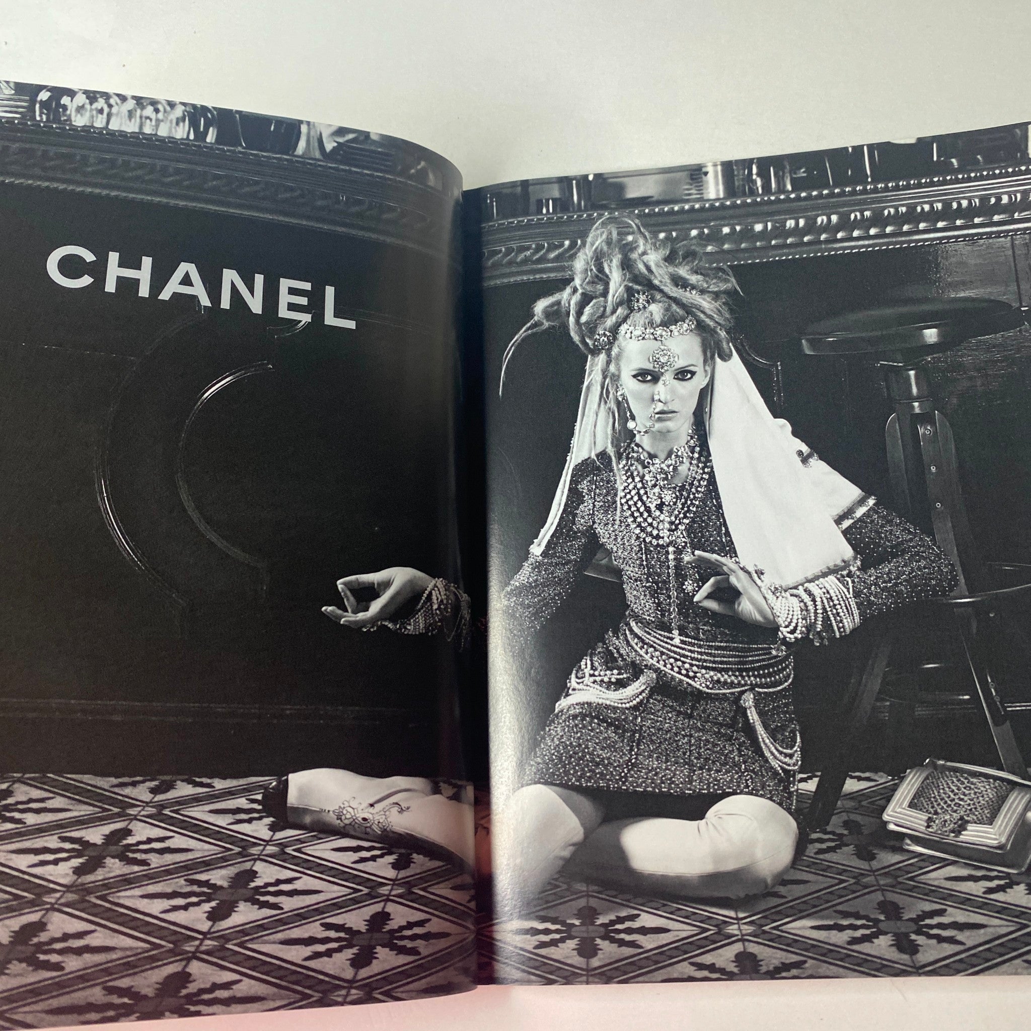 Vogue British Magazine July 2012 Rachel Weisz Cover advertisement for Chanel presenting a model in high-fashion attire.