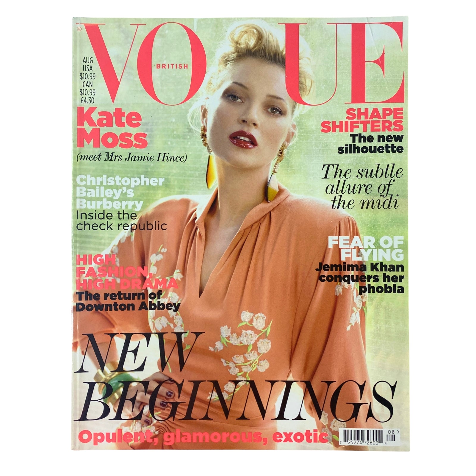 Vogue British Magazine August 2011 Kate Moss Cover showcasing elegant fashion with a floral dress and bold headlines. Ideal for collectors.