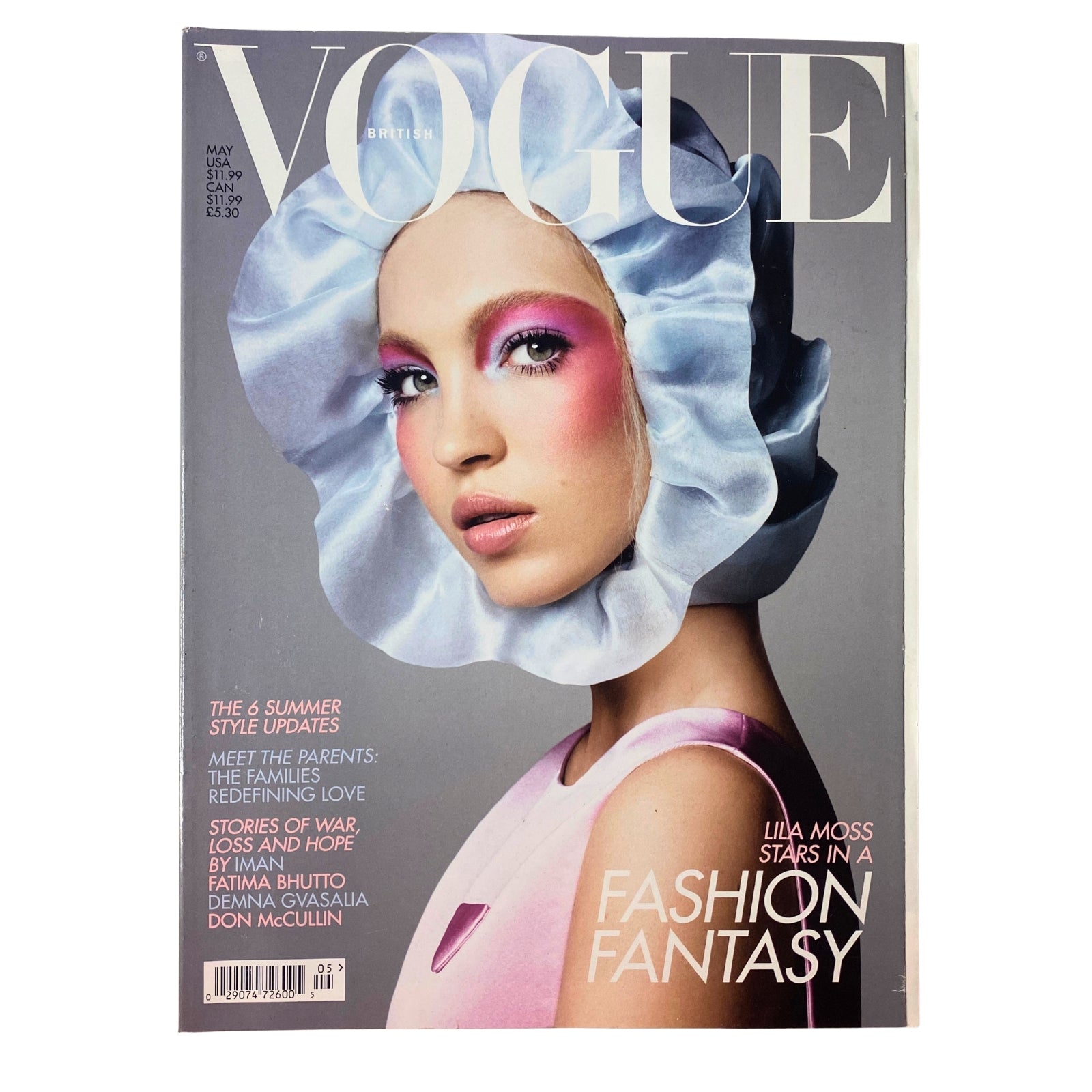 Vogue British Magazine May 2022 Lila Moss Cover featuring a stunning model in a pink outfit and blue hair wrap, showcasing fashion innovation and style, available in very good condition with no label.