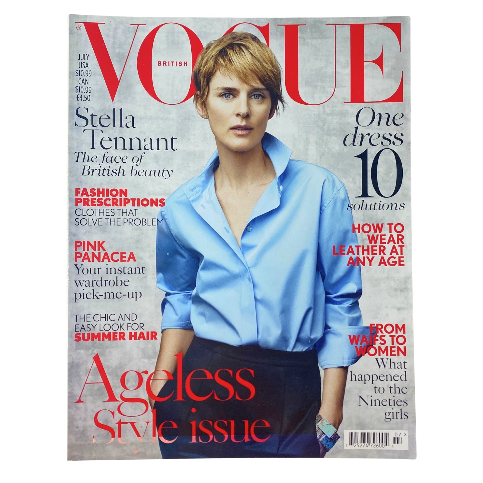 Vogue British Magazine July 2015 featuring Stella Tennant on the cover, showcasing an elegant blue blouse. This issue highlights themes of timeless fashion and modern femininity.