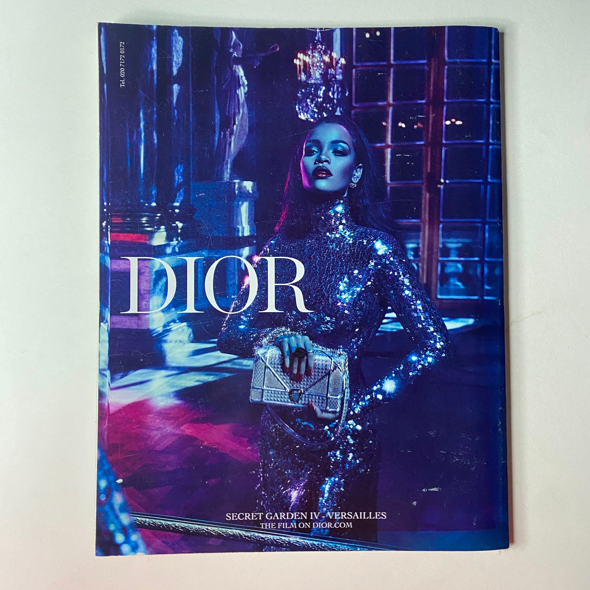 Vogue British Magazine July 2015 Stella Tennant Cover No Label VG, featuring a glamorous cover of a model in a sparkling silver outfit, holding a Dior clutch in a lavishly decorated setting, capturing the allure of high fashion.