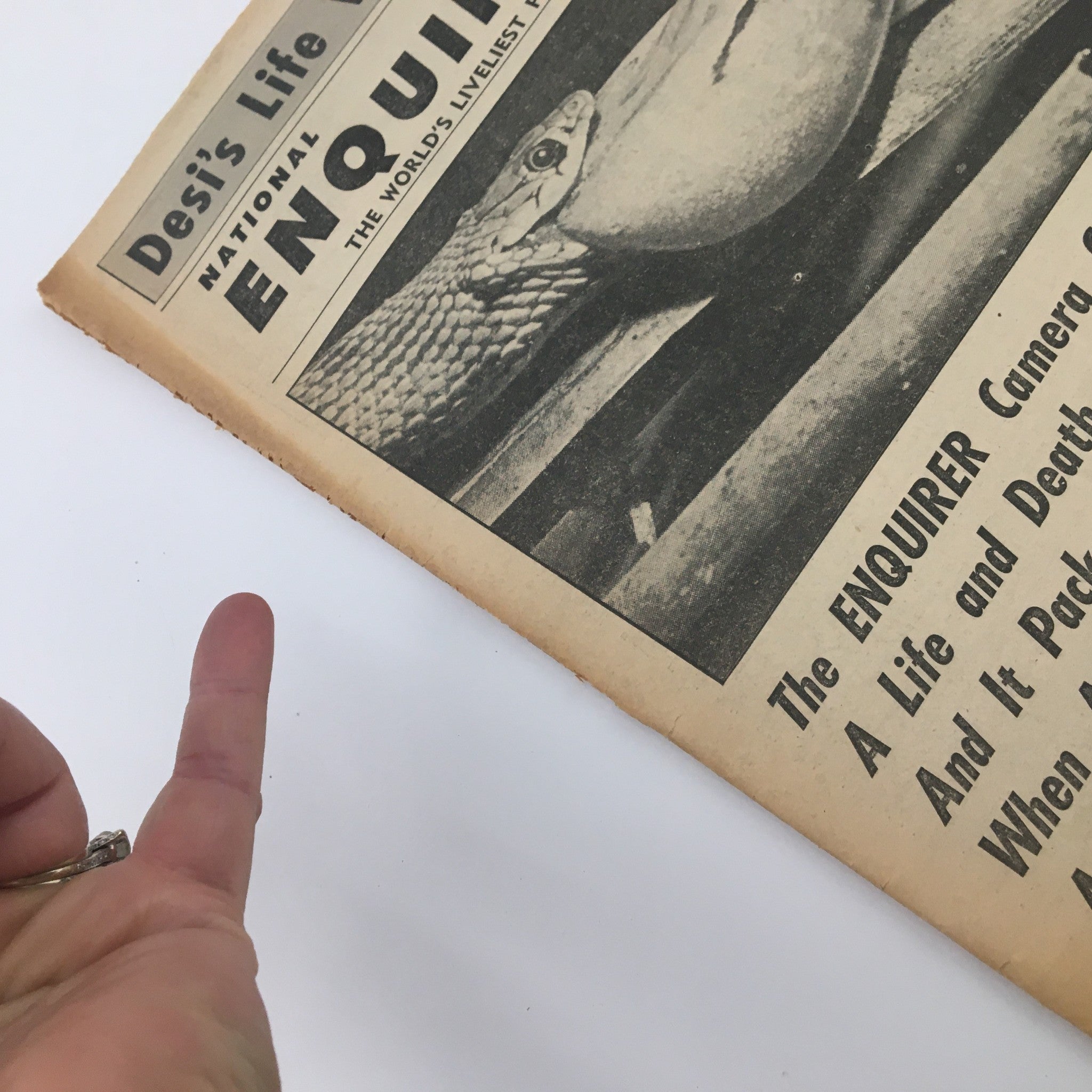Cover of National Enquirer Paper January 1 1961 showcasing a snake with the headline 'The ENQUIRER Camera Catches A Life and Death Struggle.'