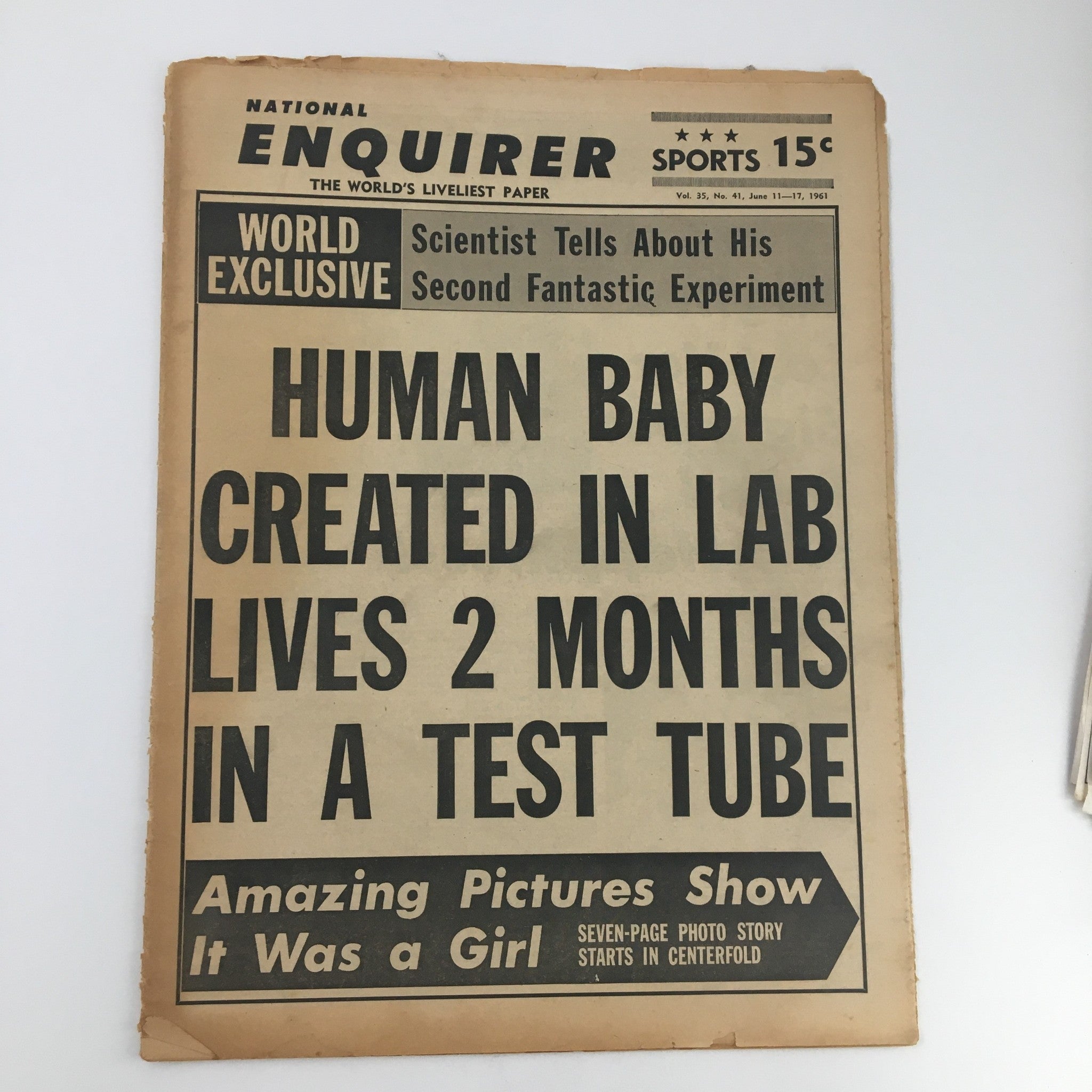 Cover of the National Enquirer Newspaper dated June 11, 1961, featuring the headline 'Human Baby Created In Lab Lives 2 Months In A Test Tube'. The cover includes a bold title and a note about an amazing photo story.