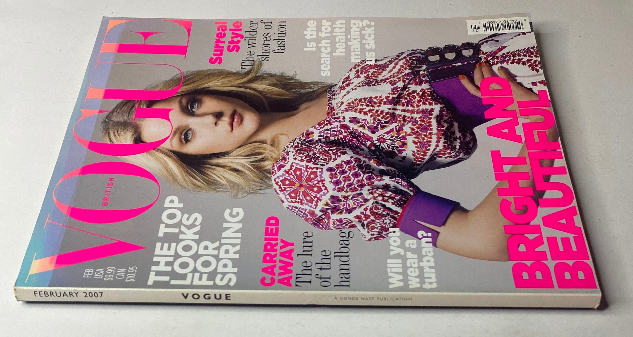 Cover of Vogue British Magazine February 2007 featuring Jessica Stam, showcasing a vibrant design with text highlighting themes of surreal fashion, spring style, and accessories.