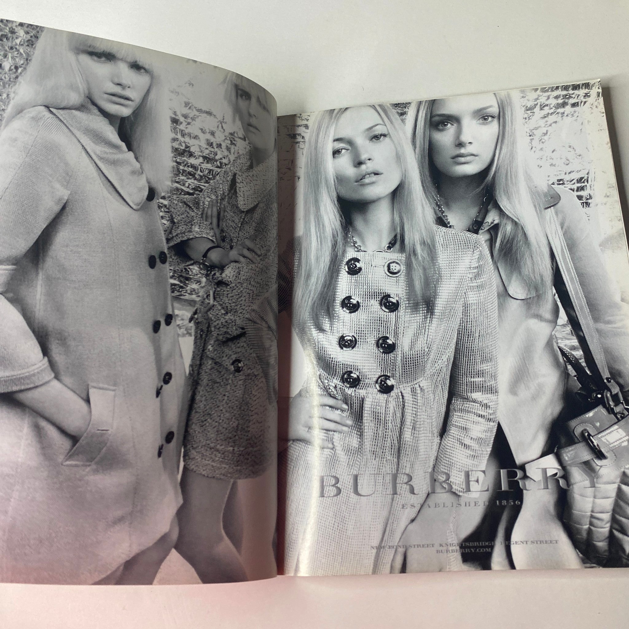 Fashion editorial spread from Vogue British Magazine February 2007, featuring models in vintage-inspired styles, highlighting sophisticated outfits from the era.